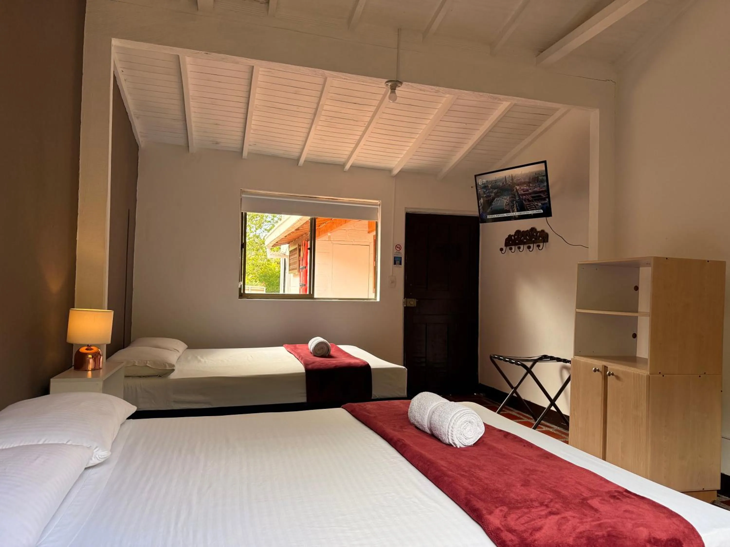 Photo of the whole room, Bed in Hotel CSI Llanogrande