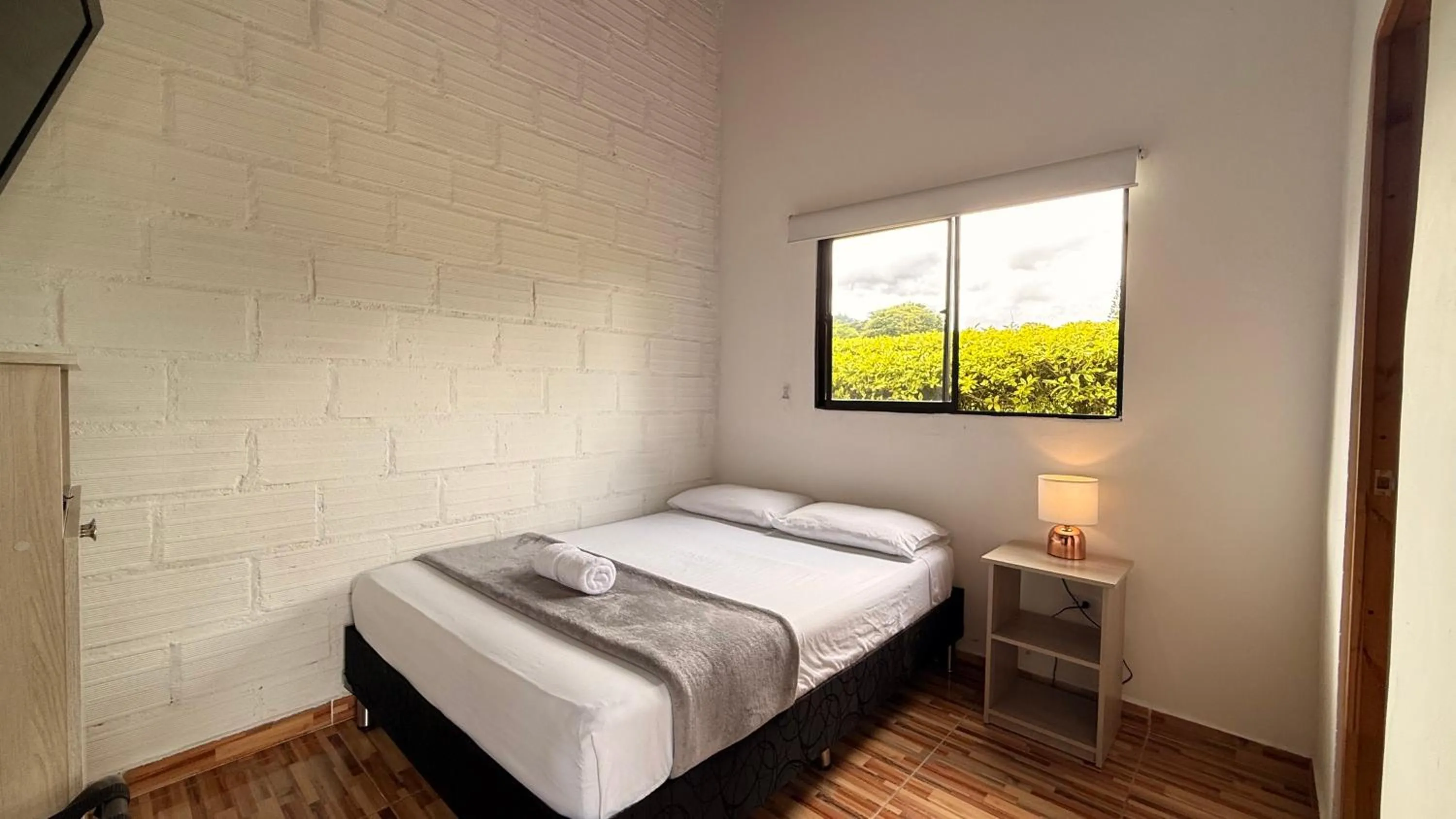 Photo of the whole room, Bed in Hotel CSI Llanogrande