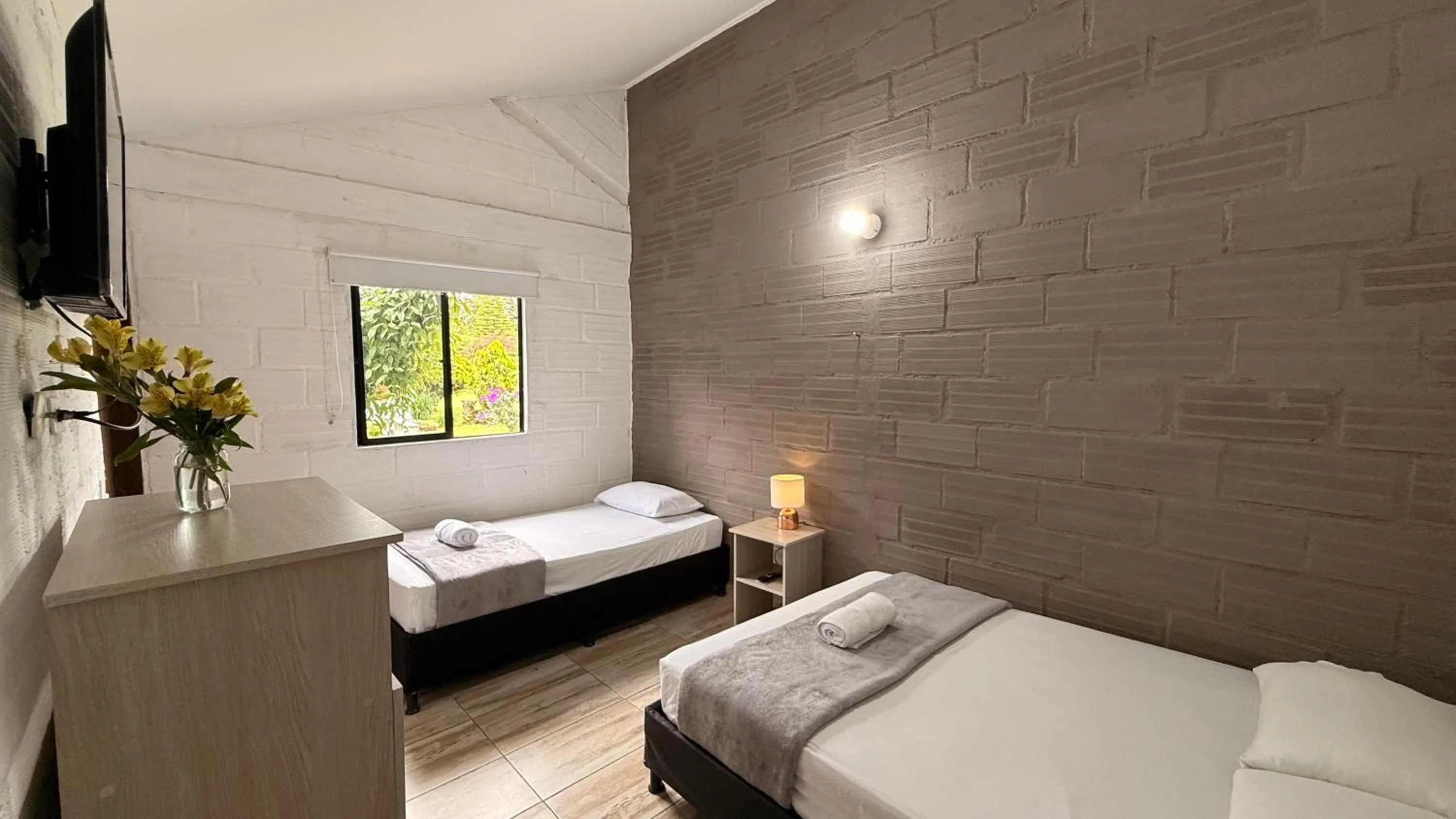 Photo of the whole room, Bed in Hotel CSI Llanogrande