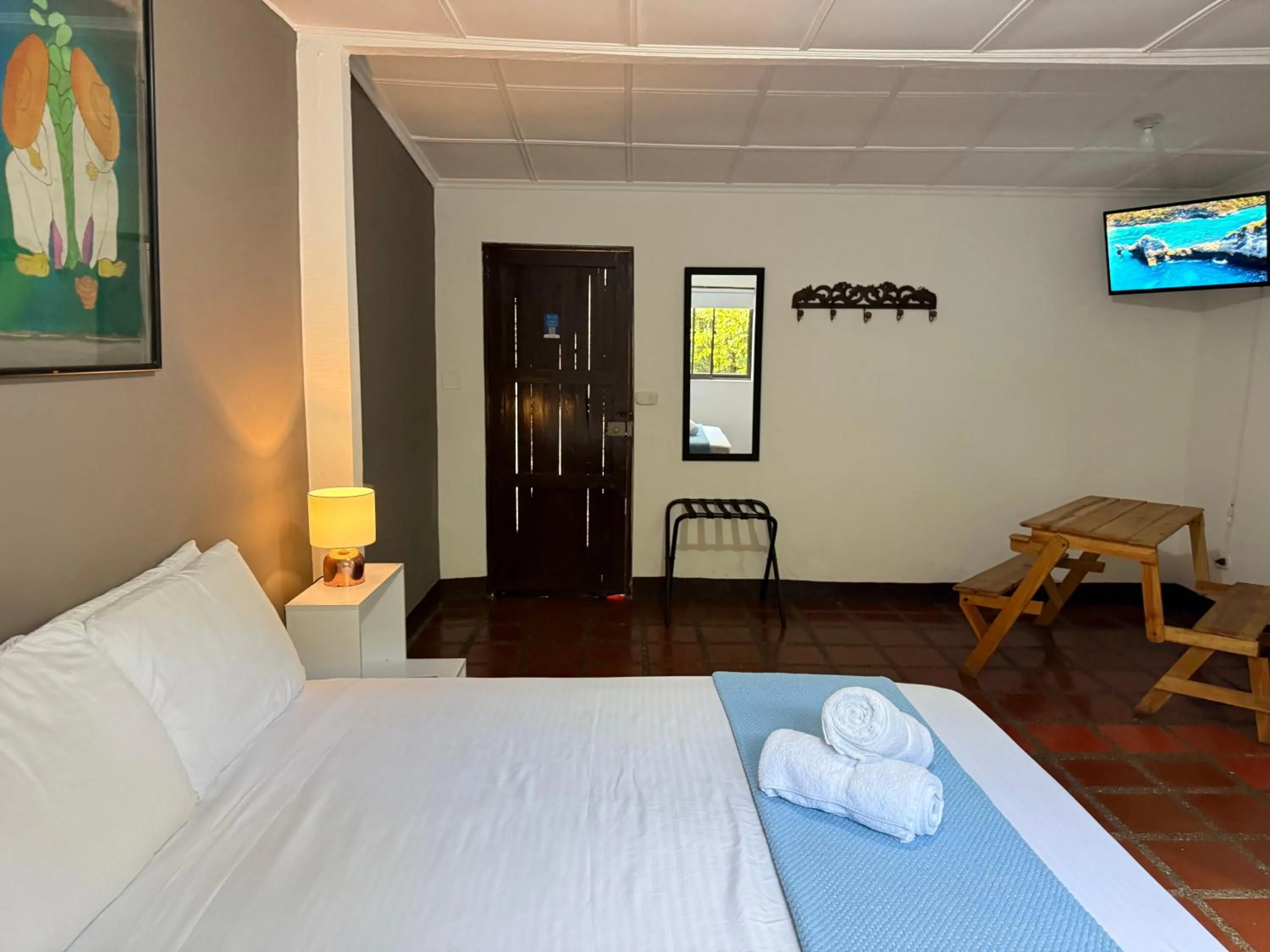Photo of the whole room, Bed in Hotel CSI Llanogrande