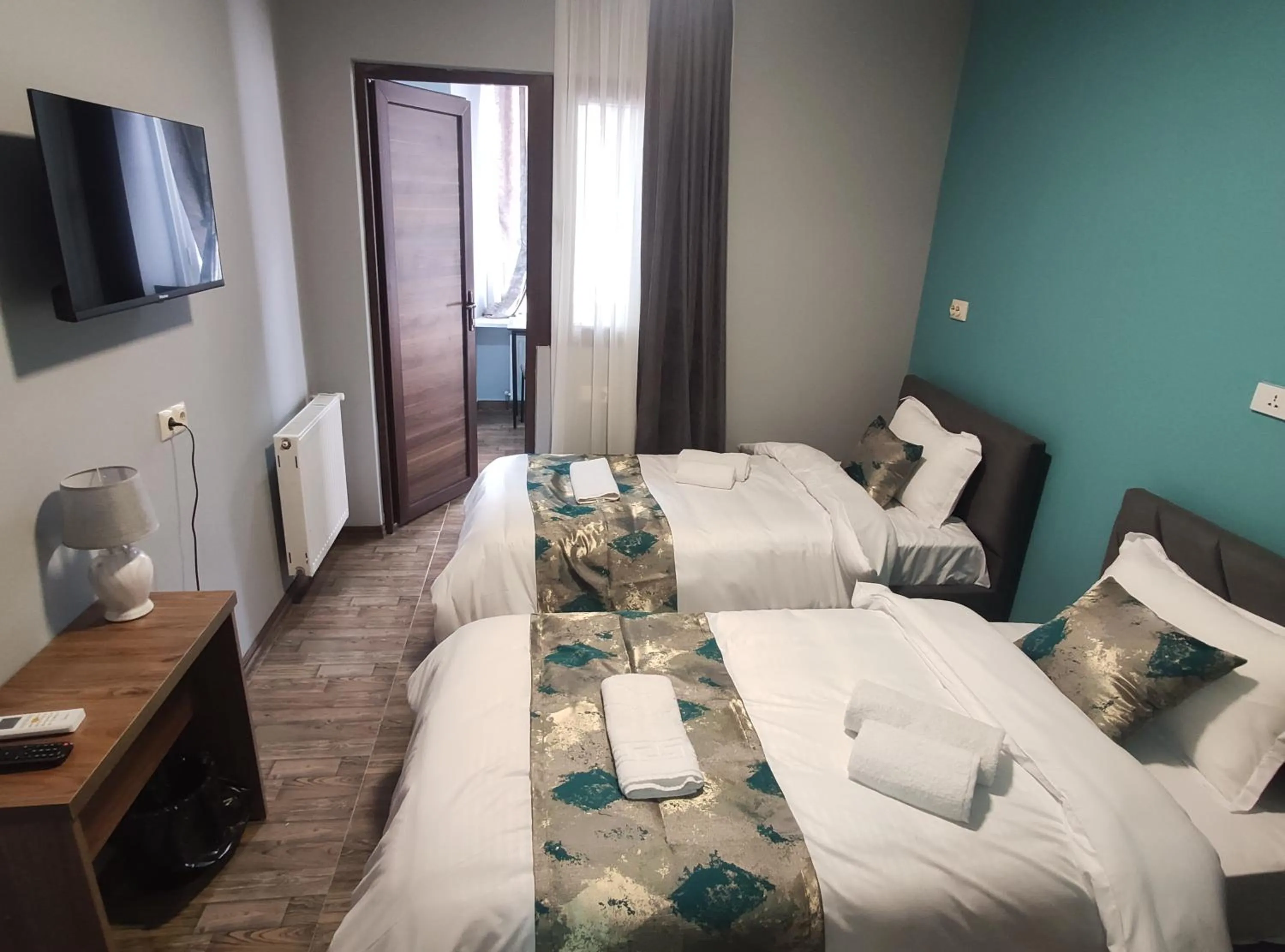 Photo of the whole room, Bed in tbilicity hotel