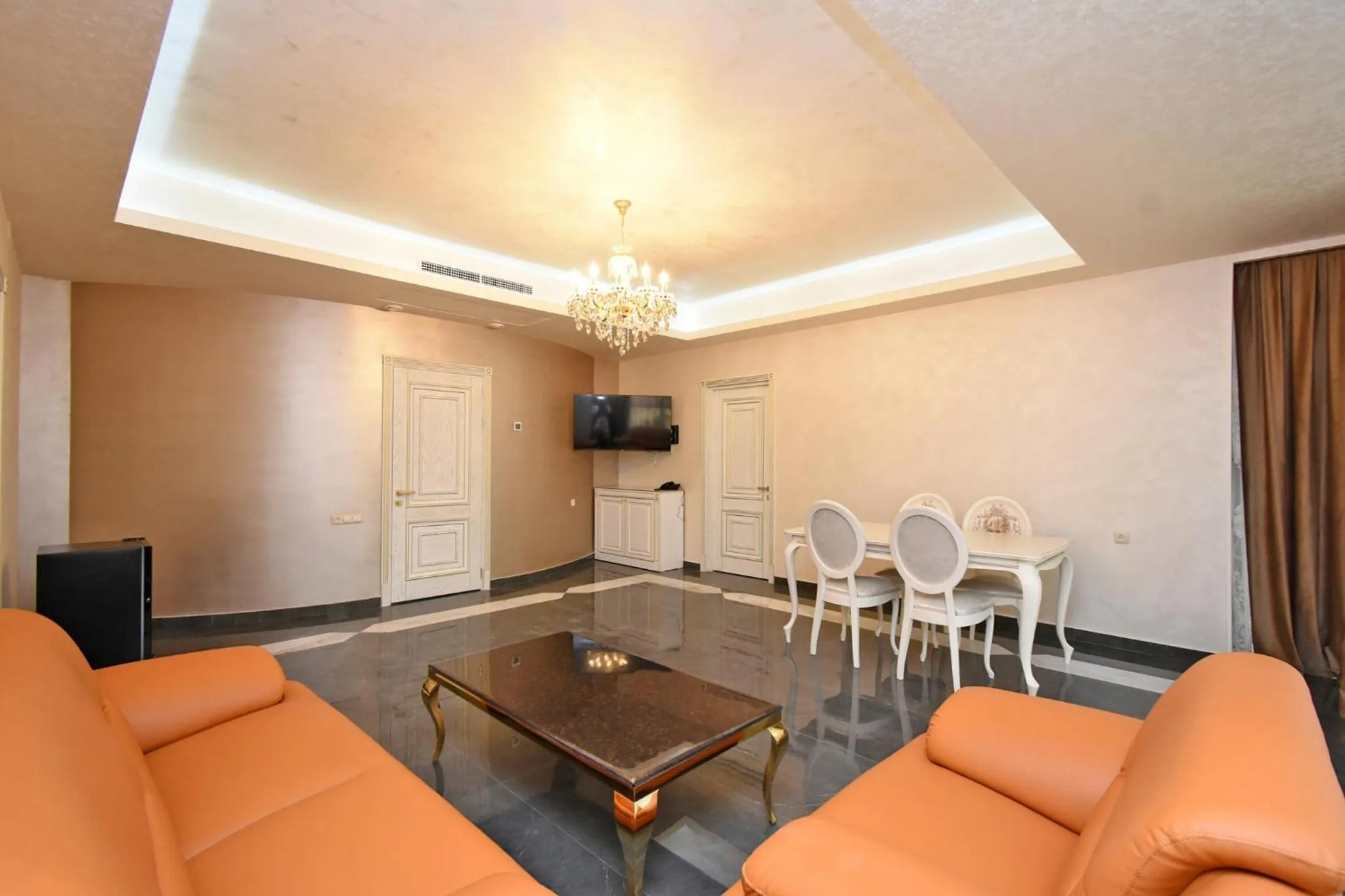 Communal lounge/ TV room in Macao Hotel