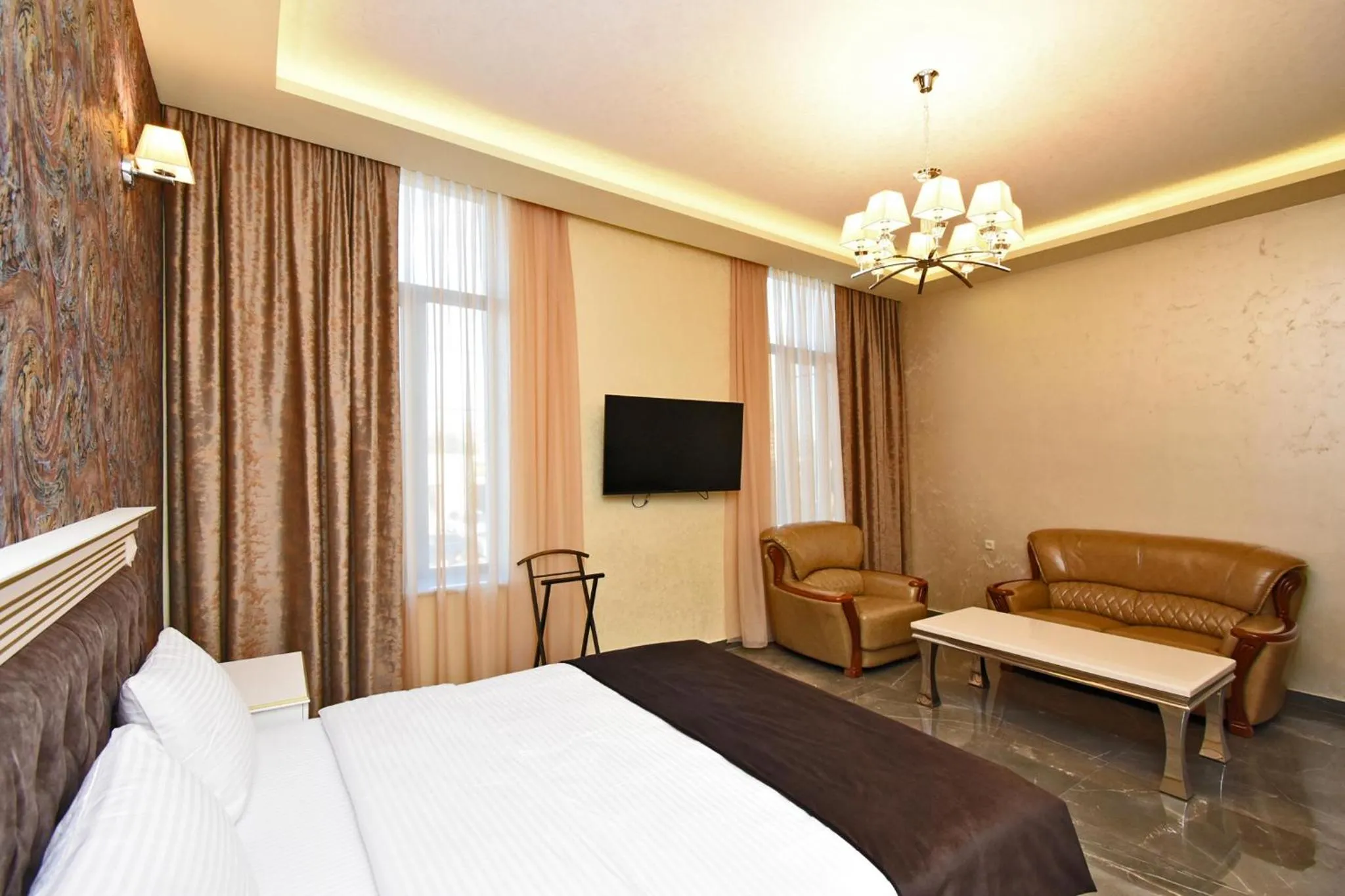 Communal lounge/ TV room, Bed in Macao Hotel