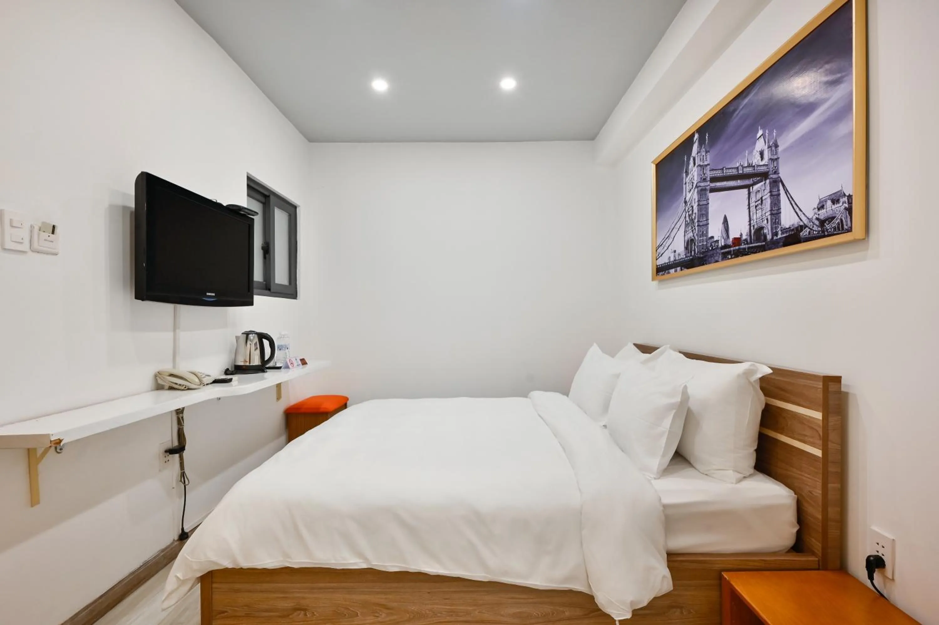 Bed in The Noble Swan Hotel Saigon