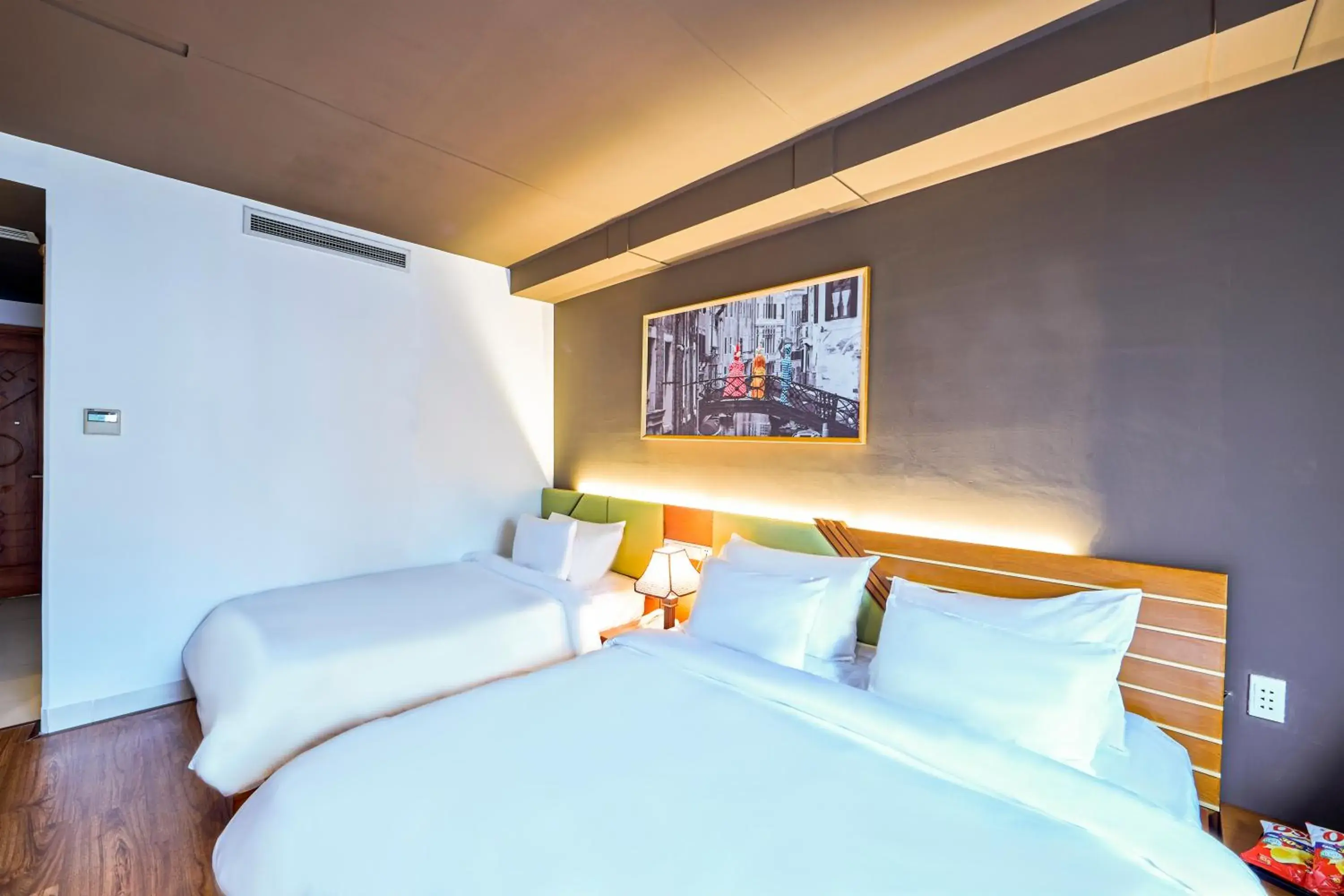 Bed in The Noble Swan Hotel Saigon Bed in The Noble Swan Hotel Saigon