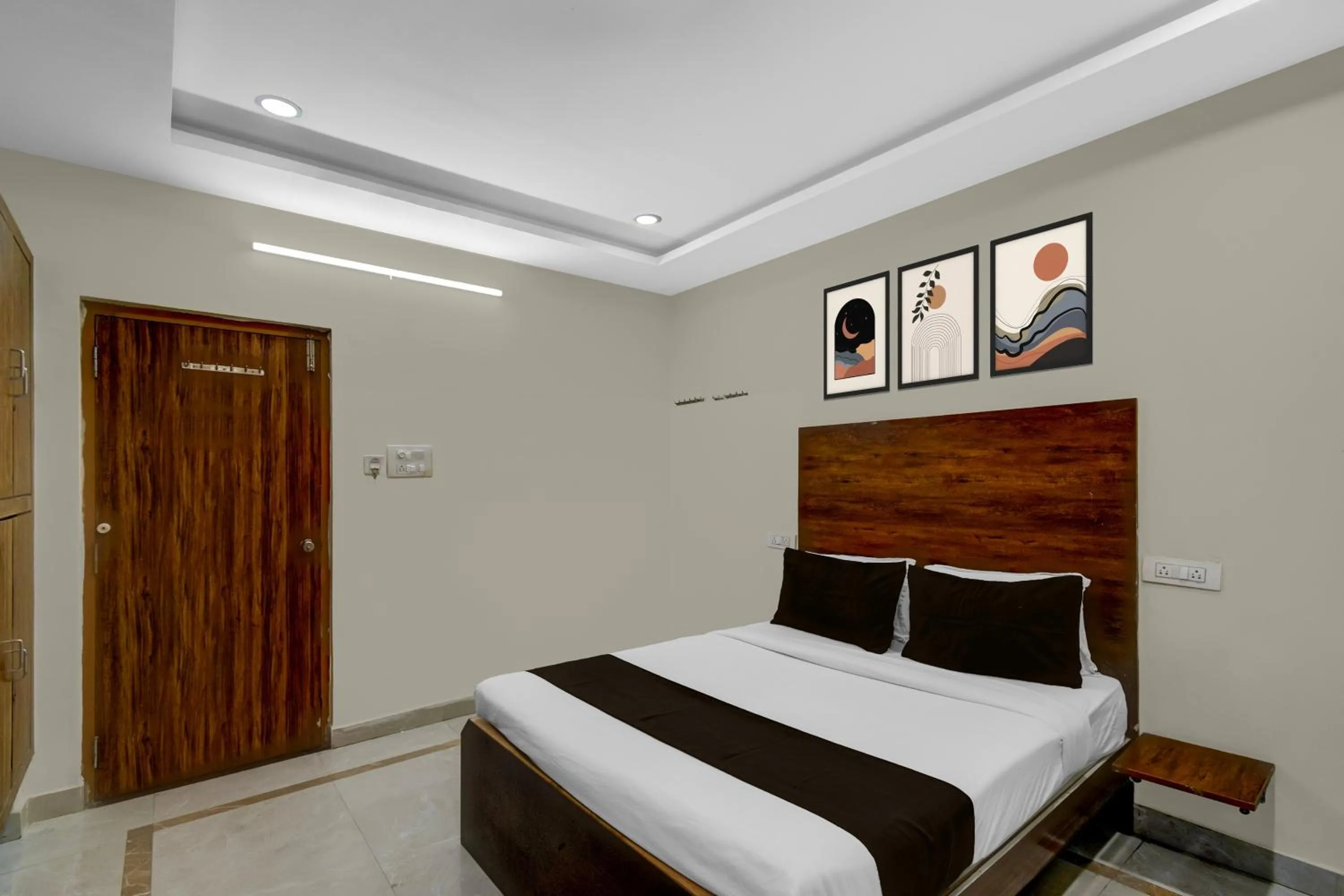 Bedroom, Bed in Townhouse Financial District Gachibowli Formerly Srinika Inn