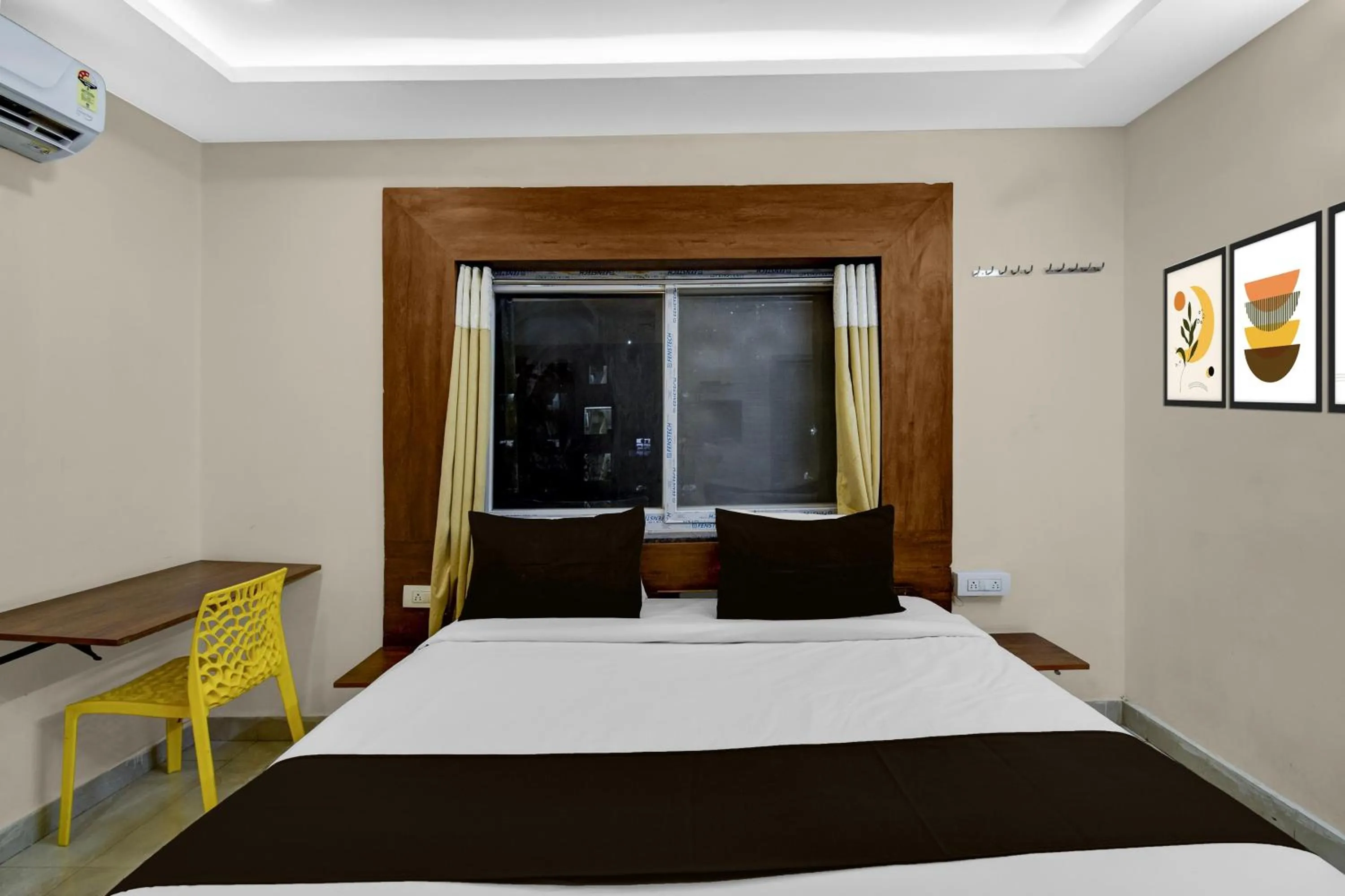 Bedroom, Bed in Townhouse Financial District Gachibowli Formerly Srinika Inn