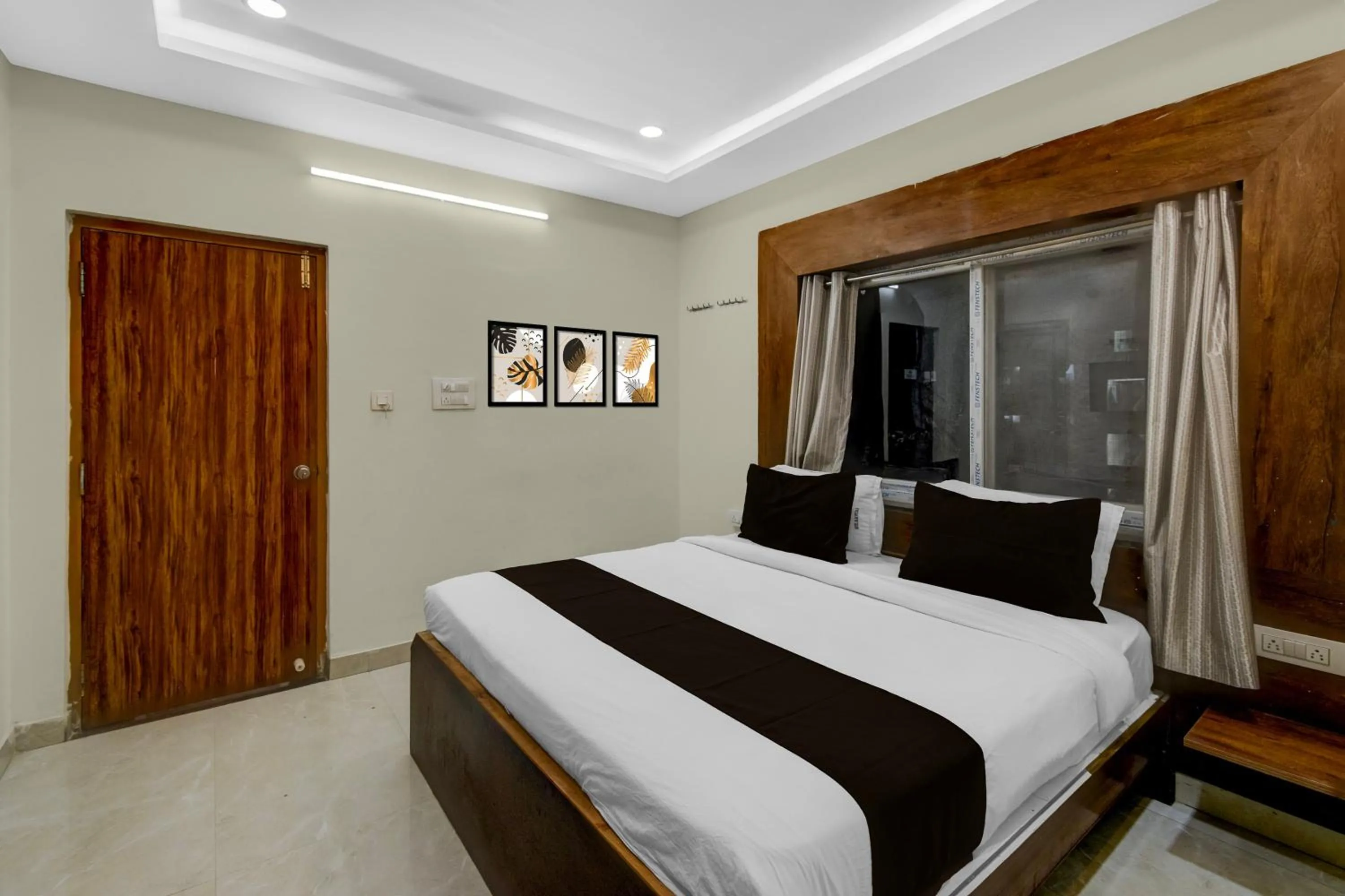 Bedroom, Bed in Townhouse Financial District Gachibowli Formerly Srinika Inn