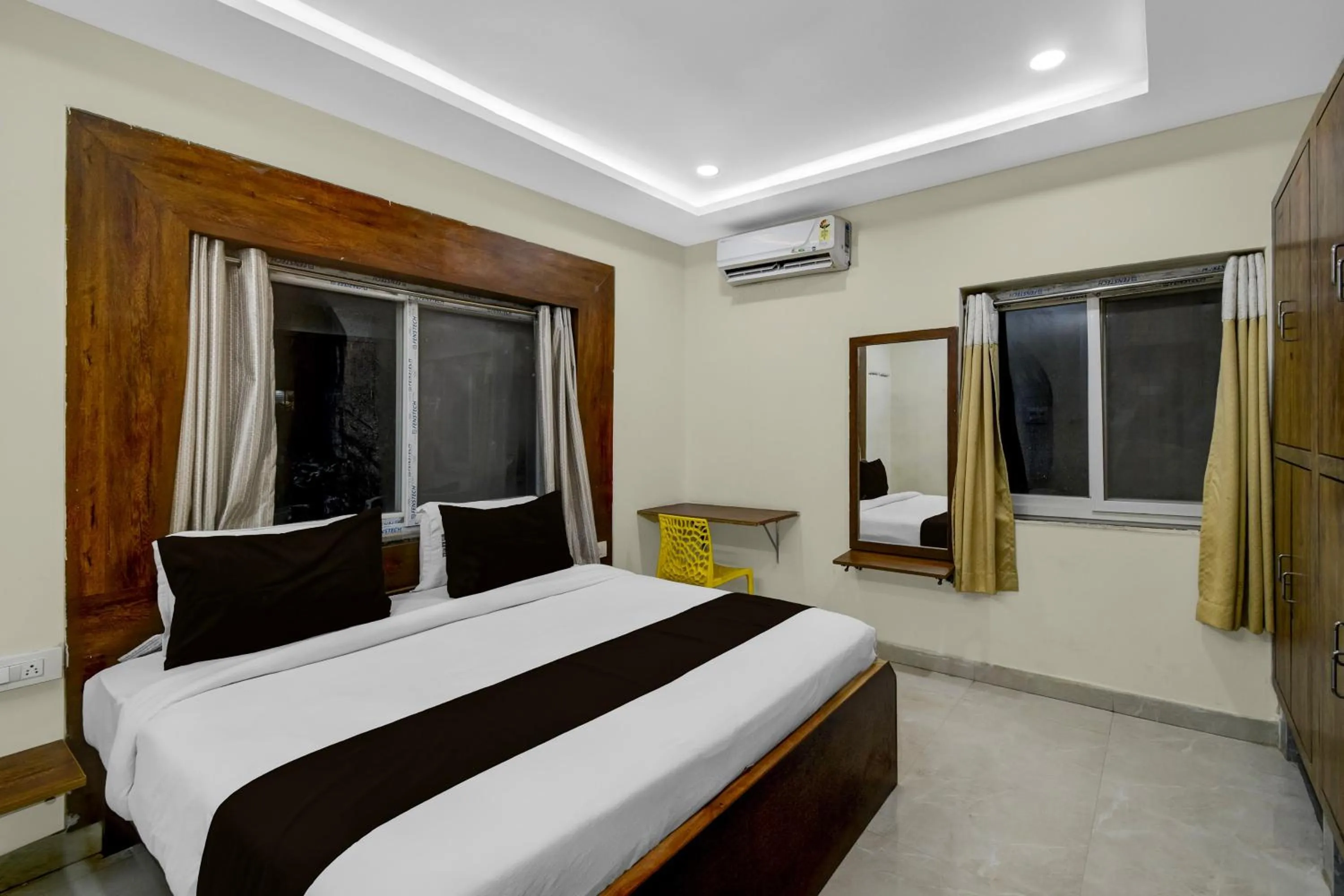 Bedroom, Bed in Townhouse Financial District Gachibowli Formerly Srinika Inn