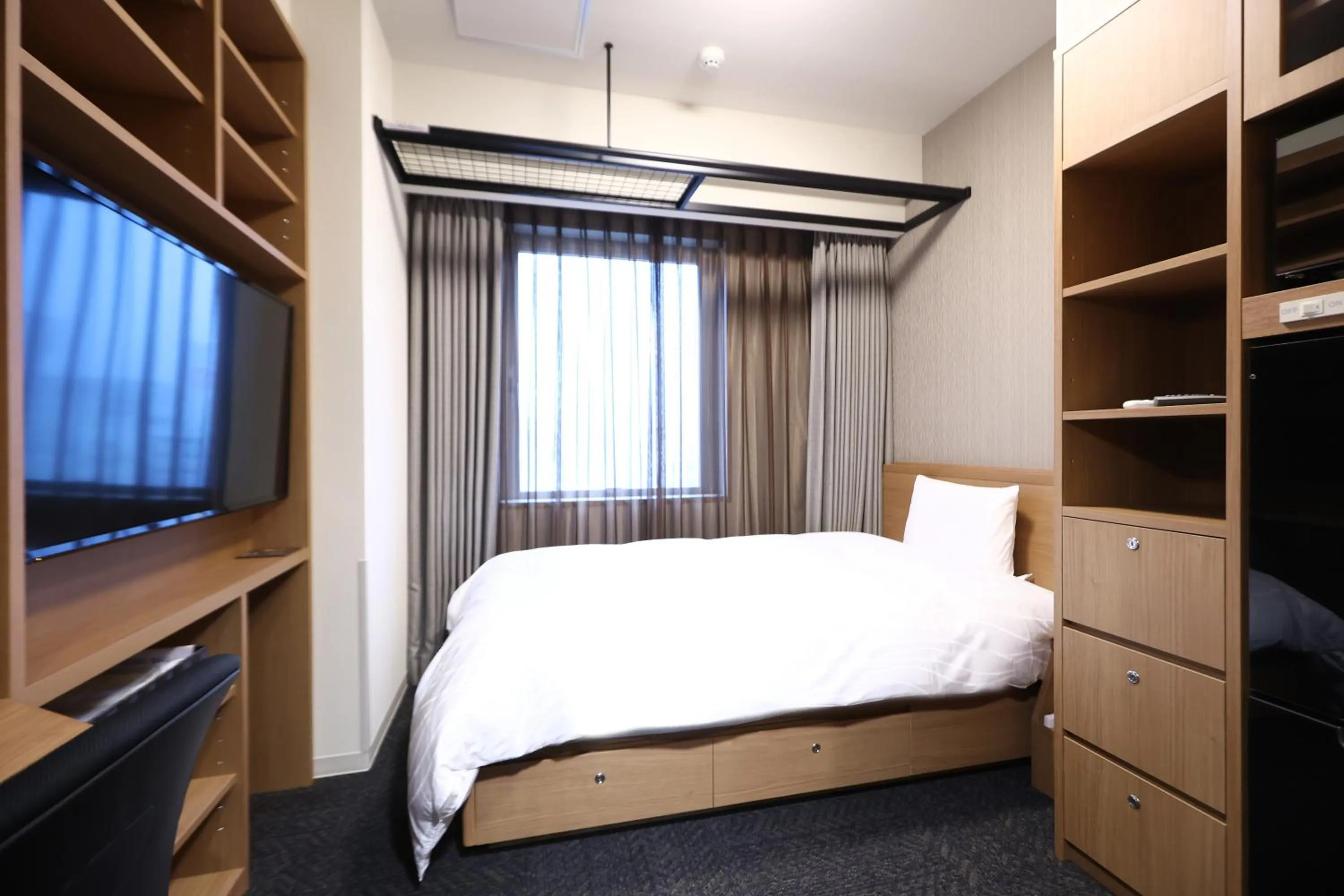 Bed in Dormy Inn Okayama Natural Hot Spring