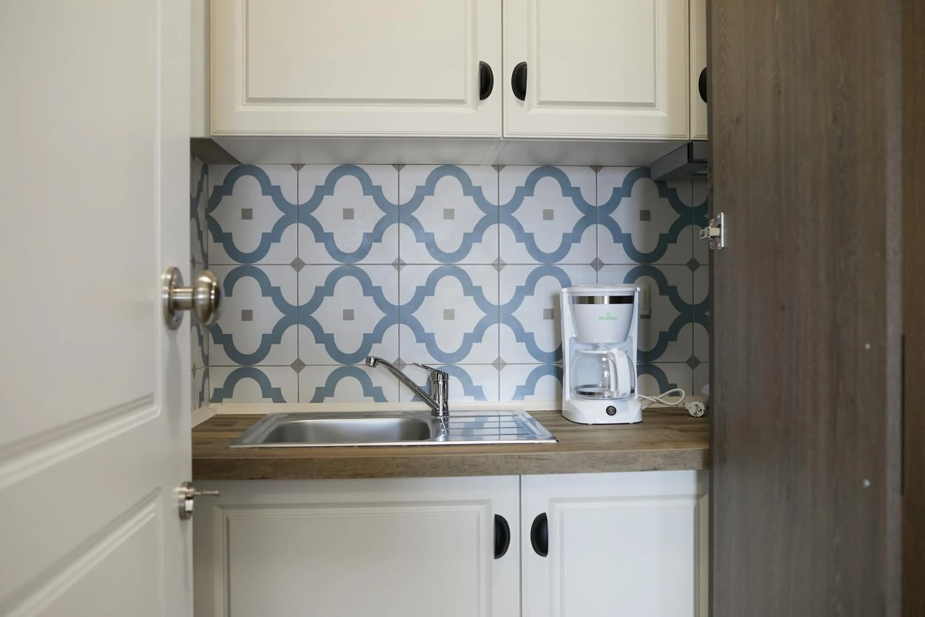 Kitchen or kitchenette in Romilia Guesthouse