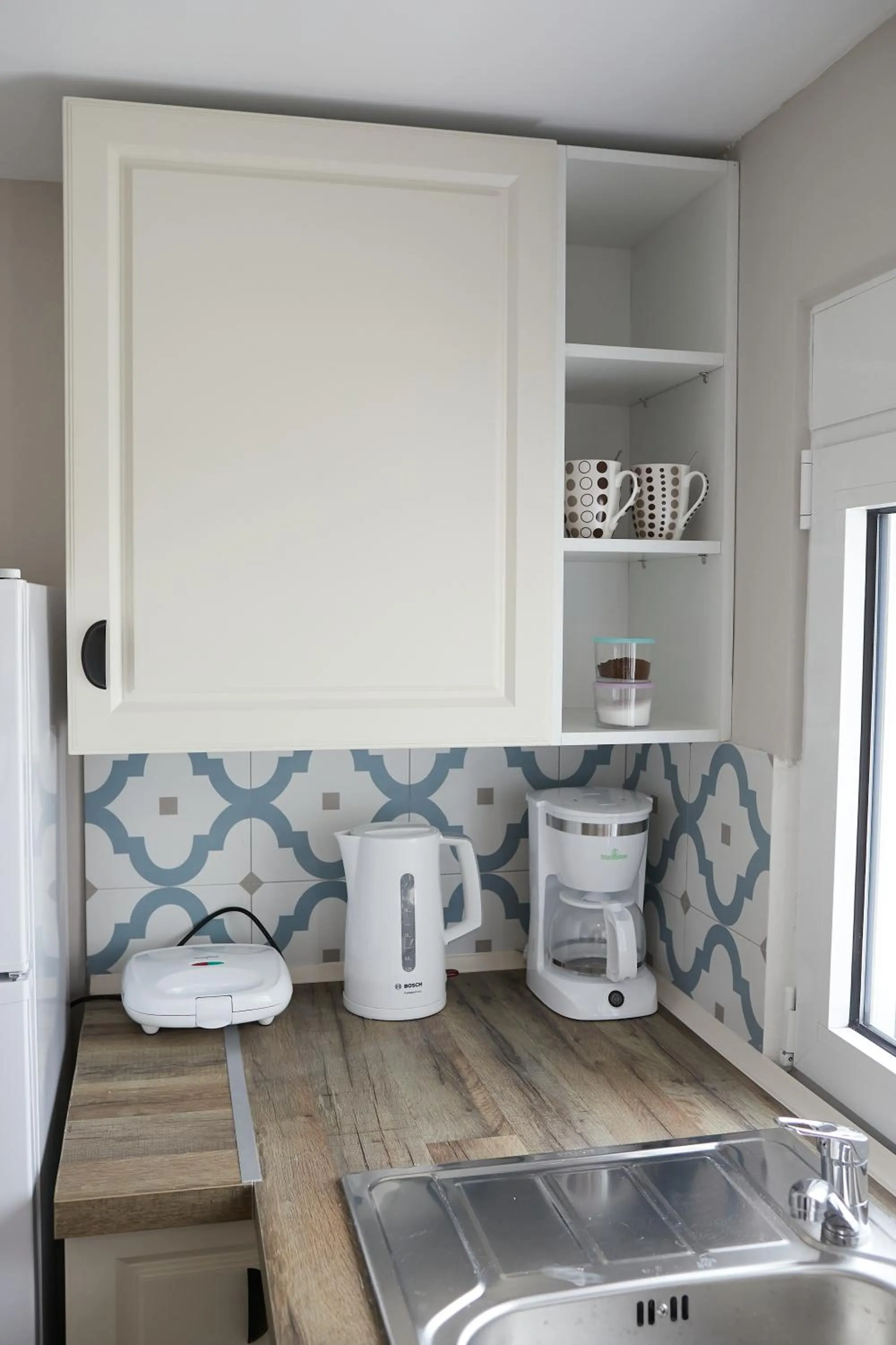 Kitchen or kitchenette in Romilia Guesthouse