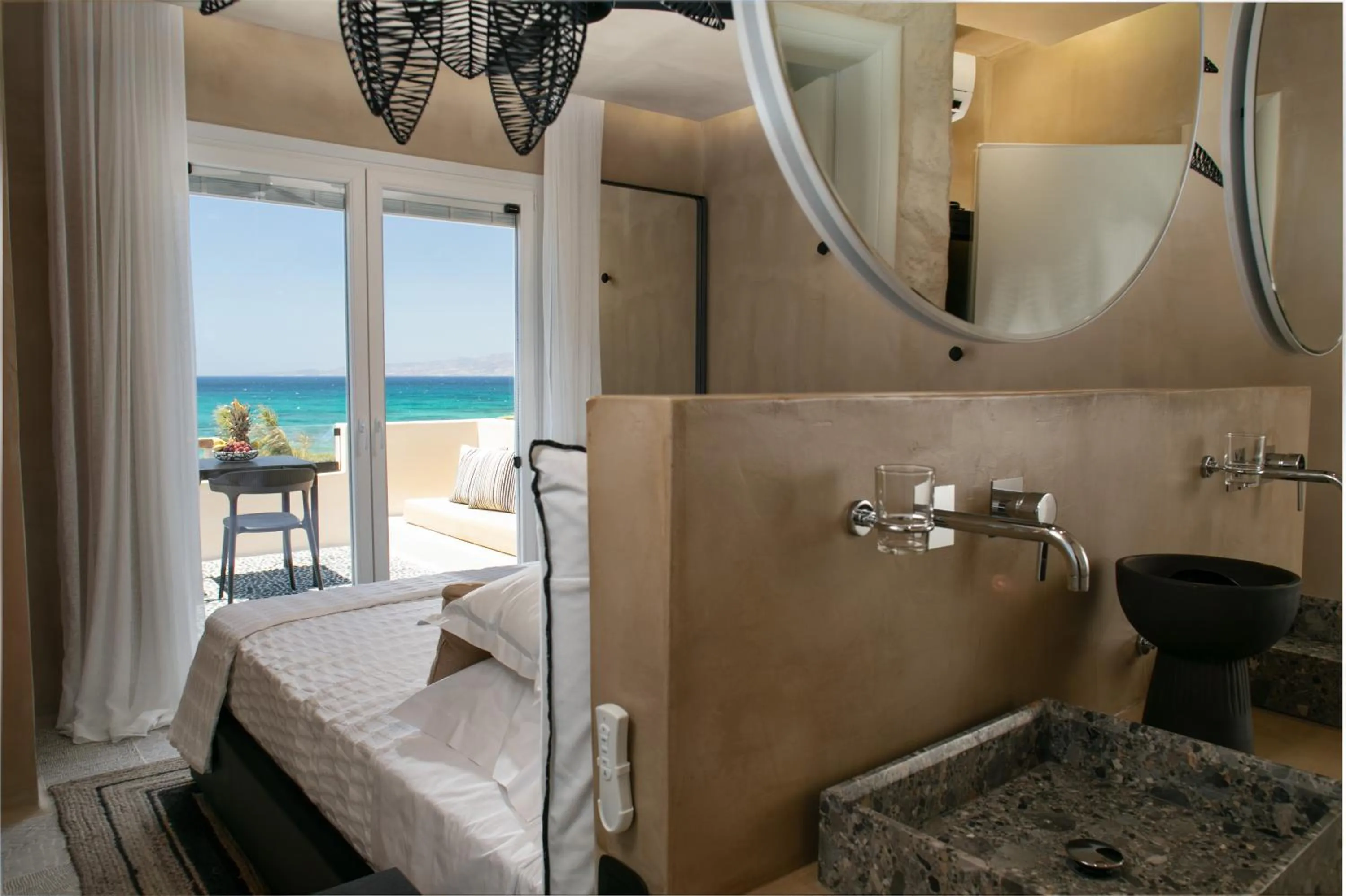 Bed in Eden Beachfront Residences & Suites