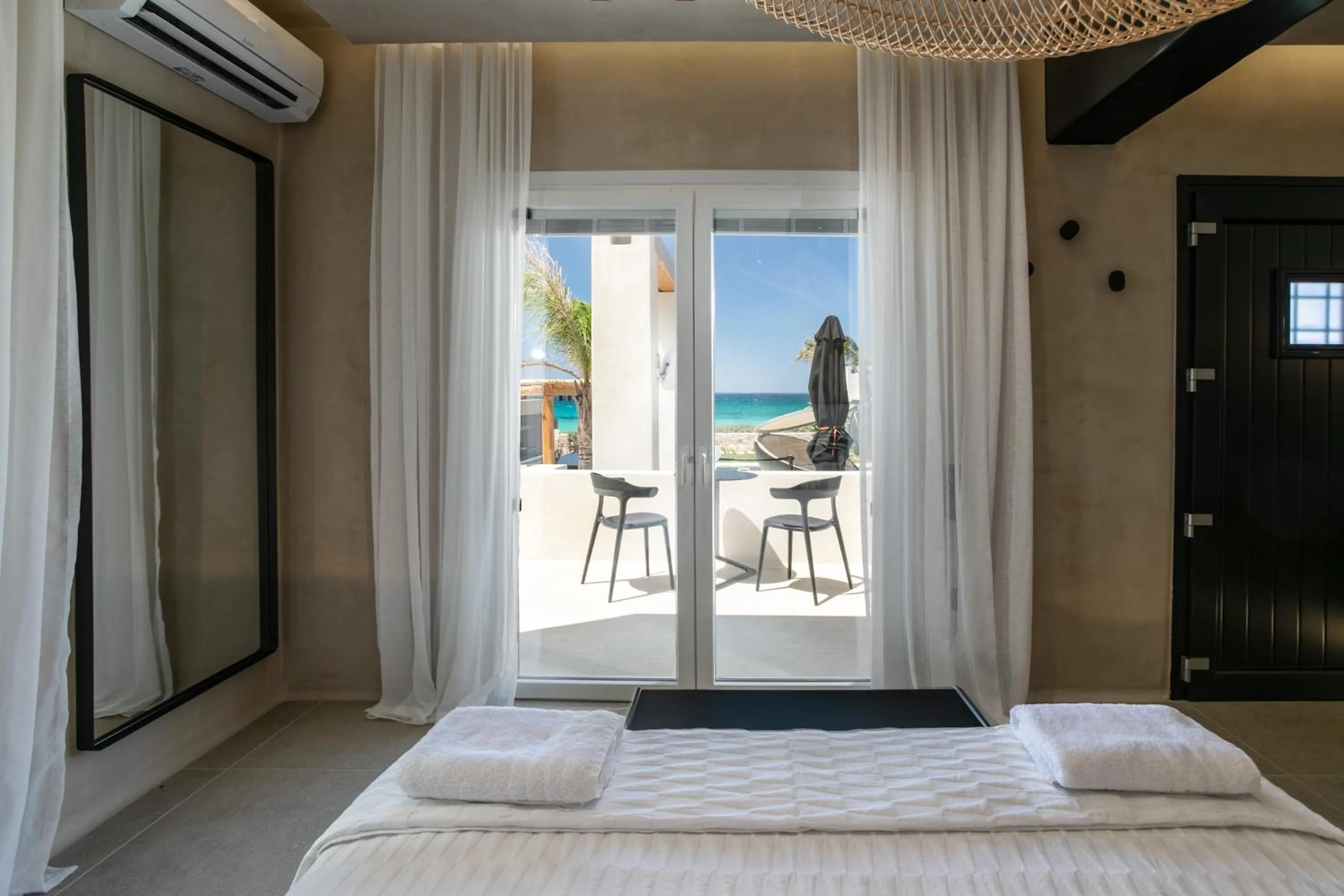 Balcony/Terrace, Bed in Eden Beachfront Residences & Suites