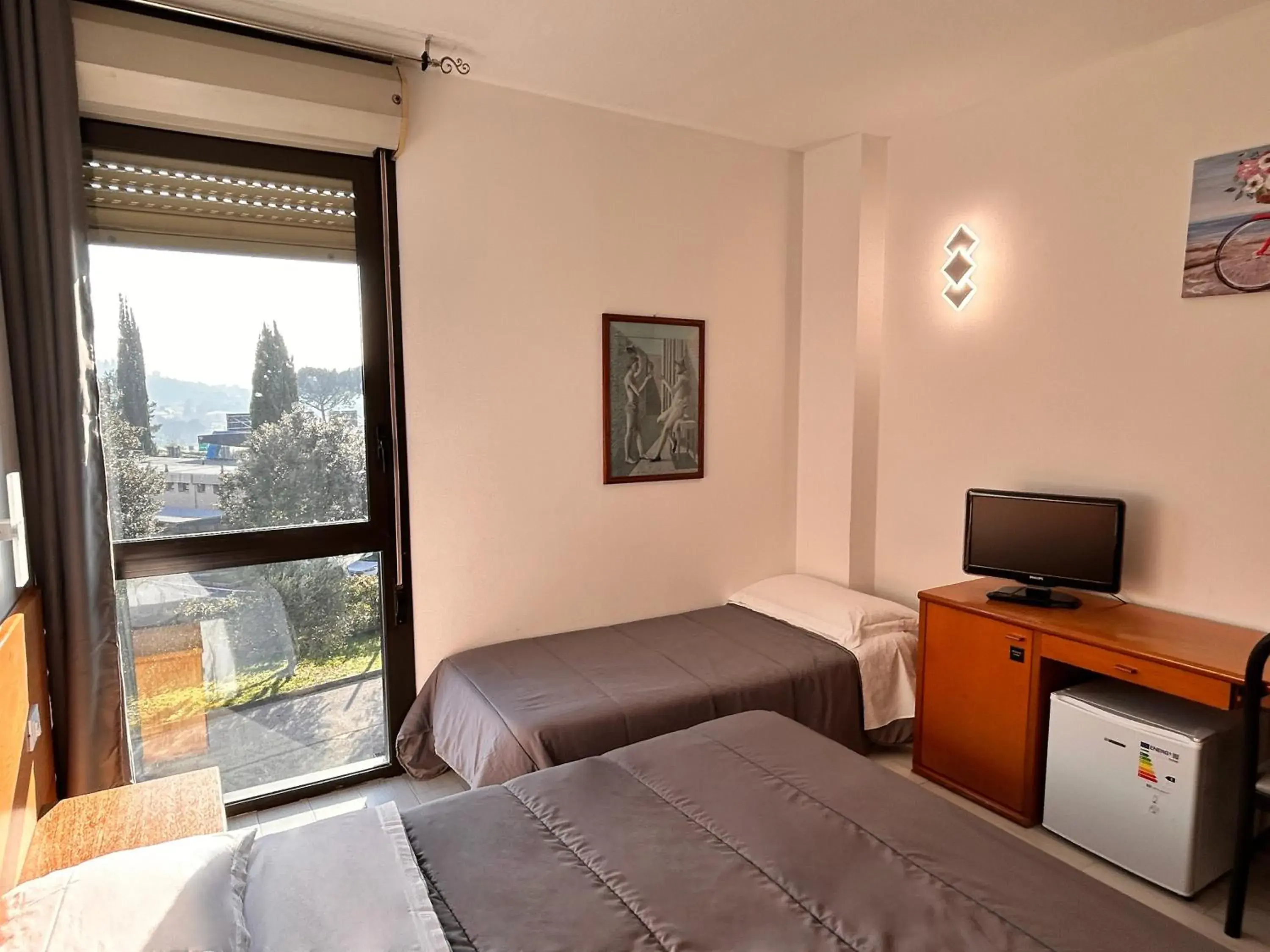 Bed in La Fenice Hotel Bed in La Fenice Hotel