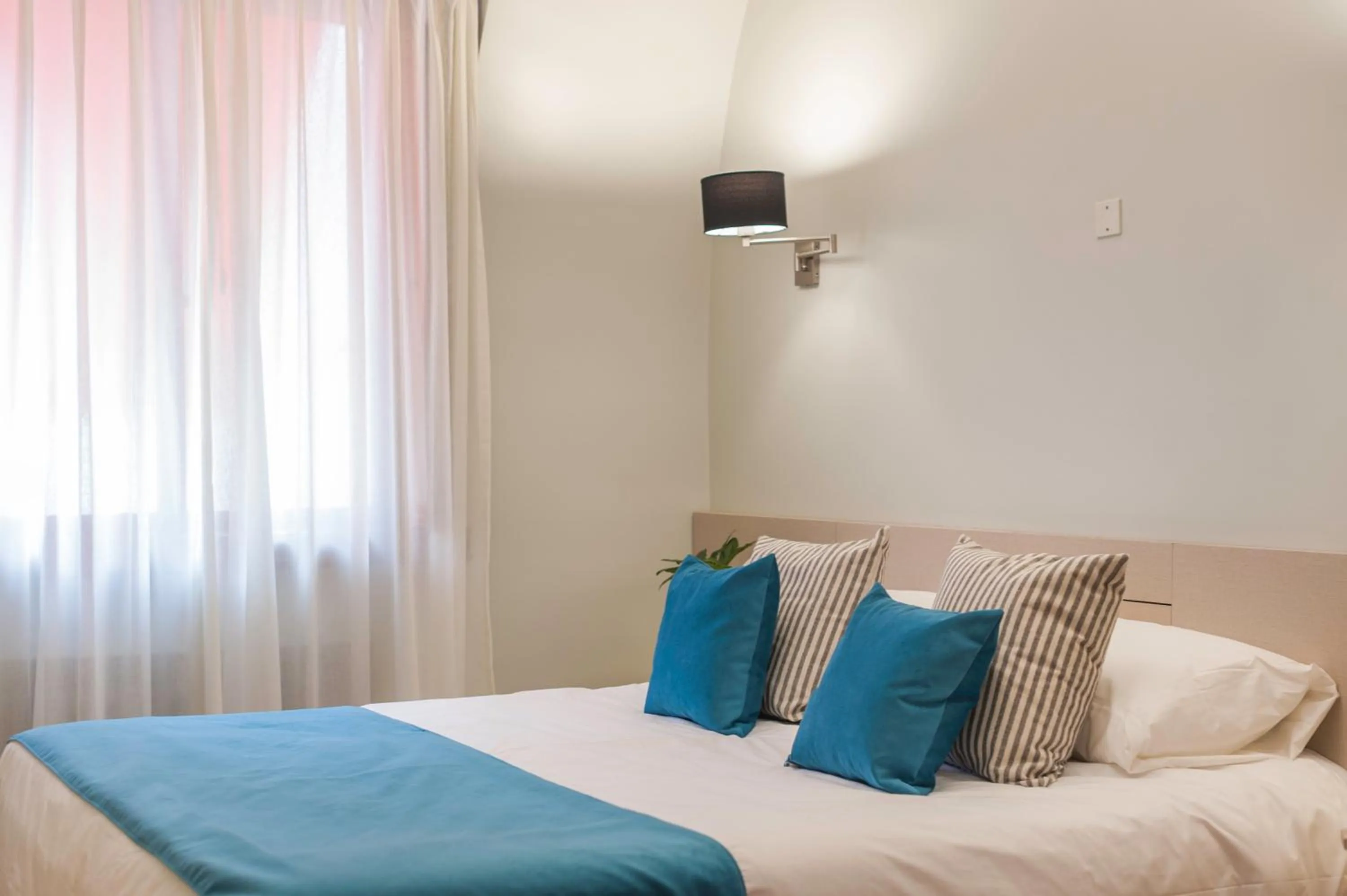 Photo of the whole room, Bed in Sarmiento Flats