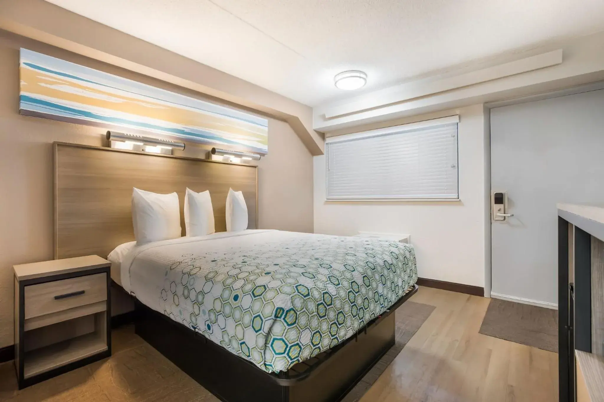 Bedroom, Bed in HomeTowne Studios by Red Roof Princeton - Ewing/ Lawrenceville Bedroom, Bed in HomeTowne Studios by Red Roof Princeton - Ewing/ Lawrenceville