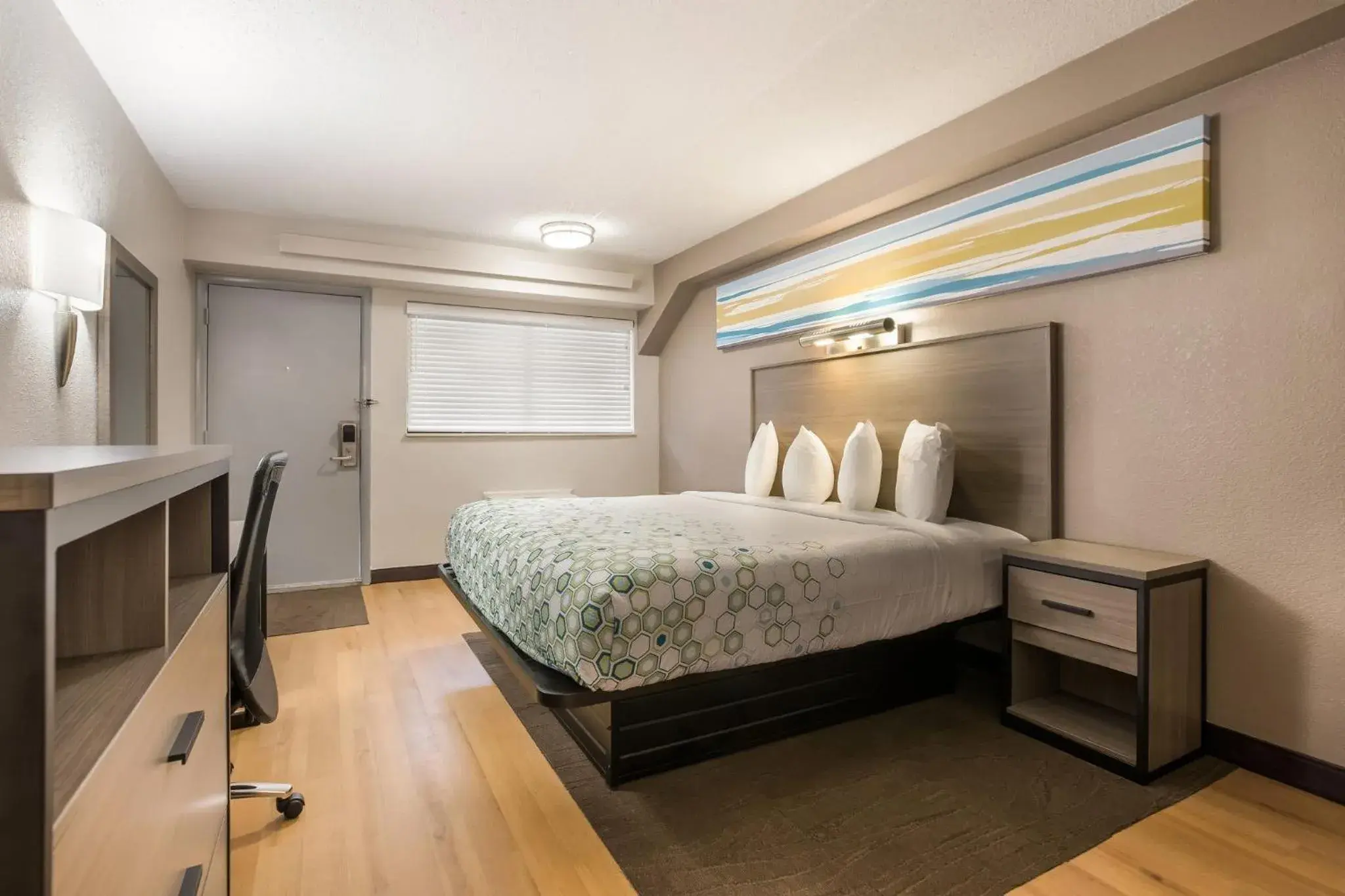 Bedroom, Bed in HomeTowne Studios by Red Roof Princeton - Ewing/ Lawrenceville Bedroom, Bed in HomeTowne Studios by Red Roof Princeton - Ewing/ Lawrenceville