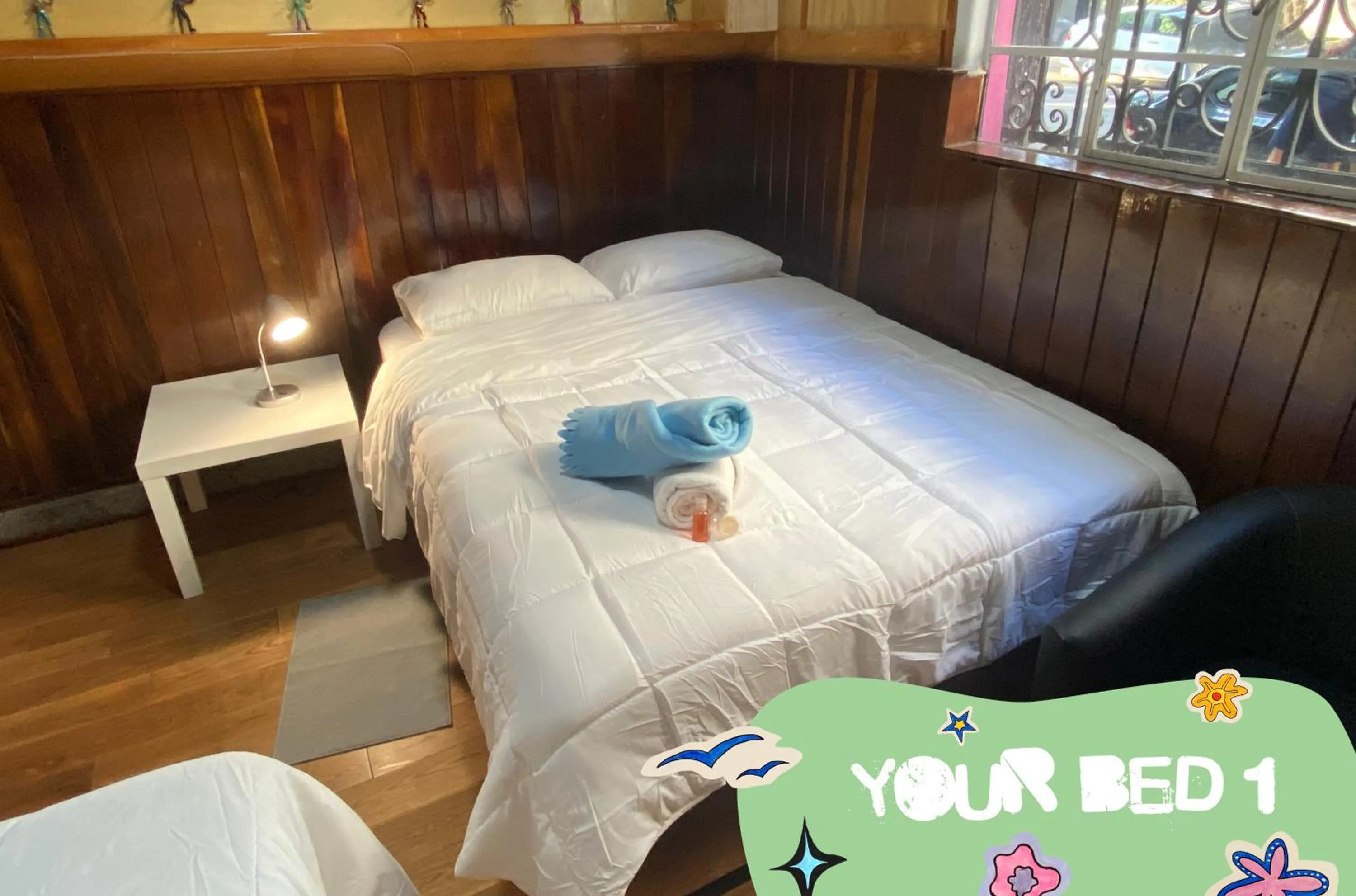 Photo of the whole room, Bed in Hostal Fungi Casa Rosa