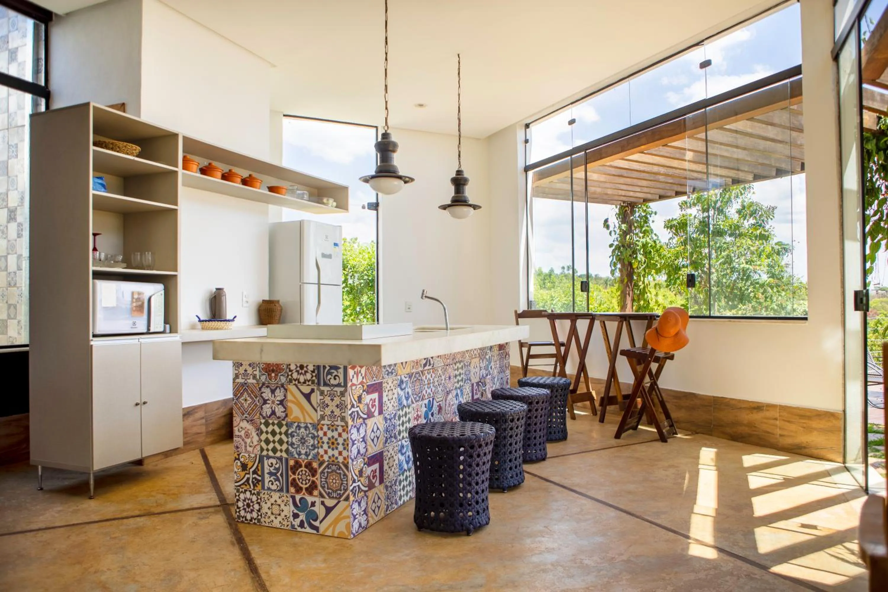 Communal kitchen in Espelho D'Água Pousada - Capitólio
