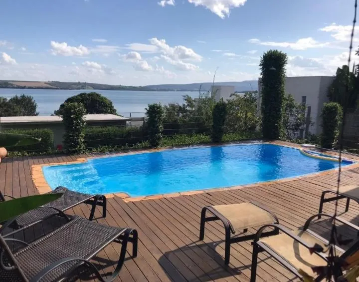 Pool view in Espelho D'Água Pousada - Capitólio