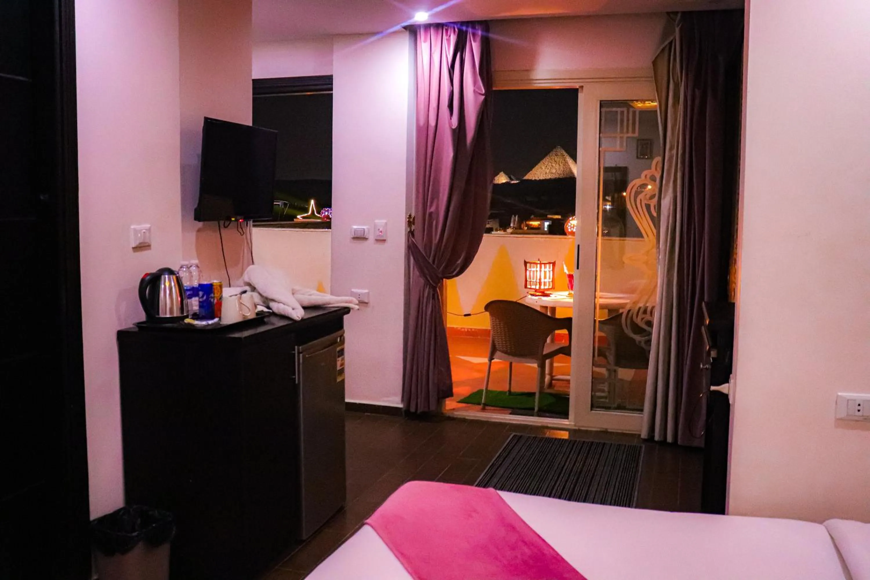 Bed in Golden Pyramids Inn