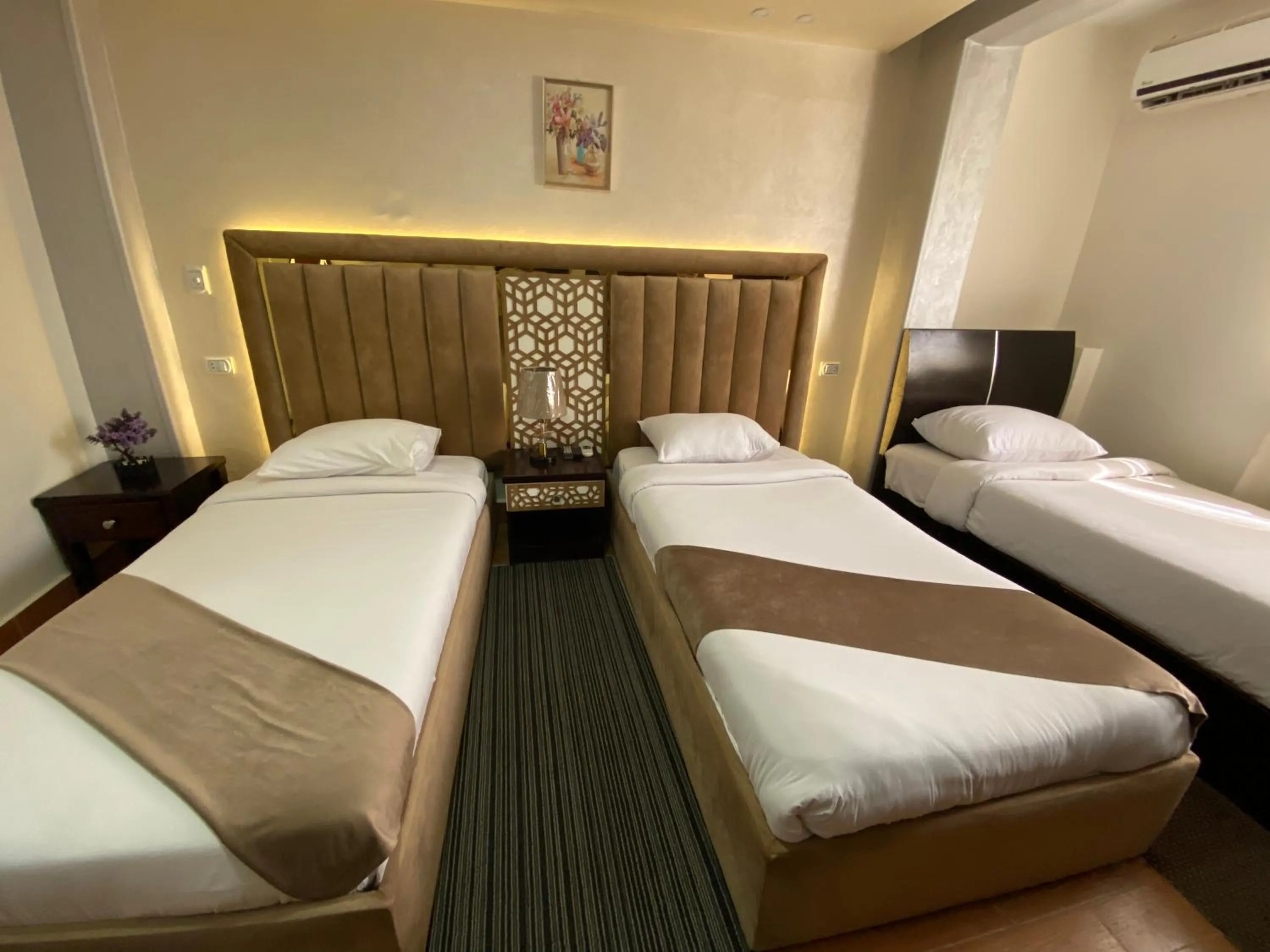 Bed in Golden Pyramids Inn