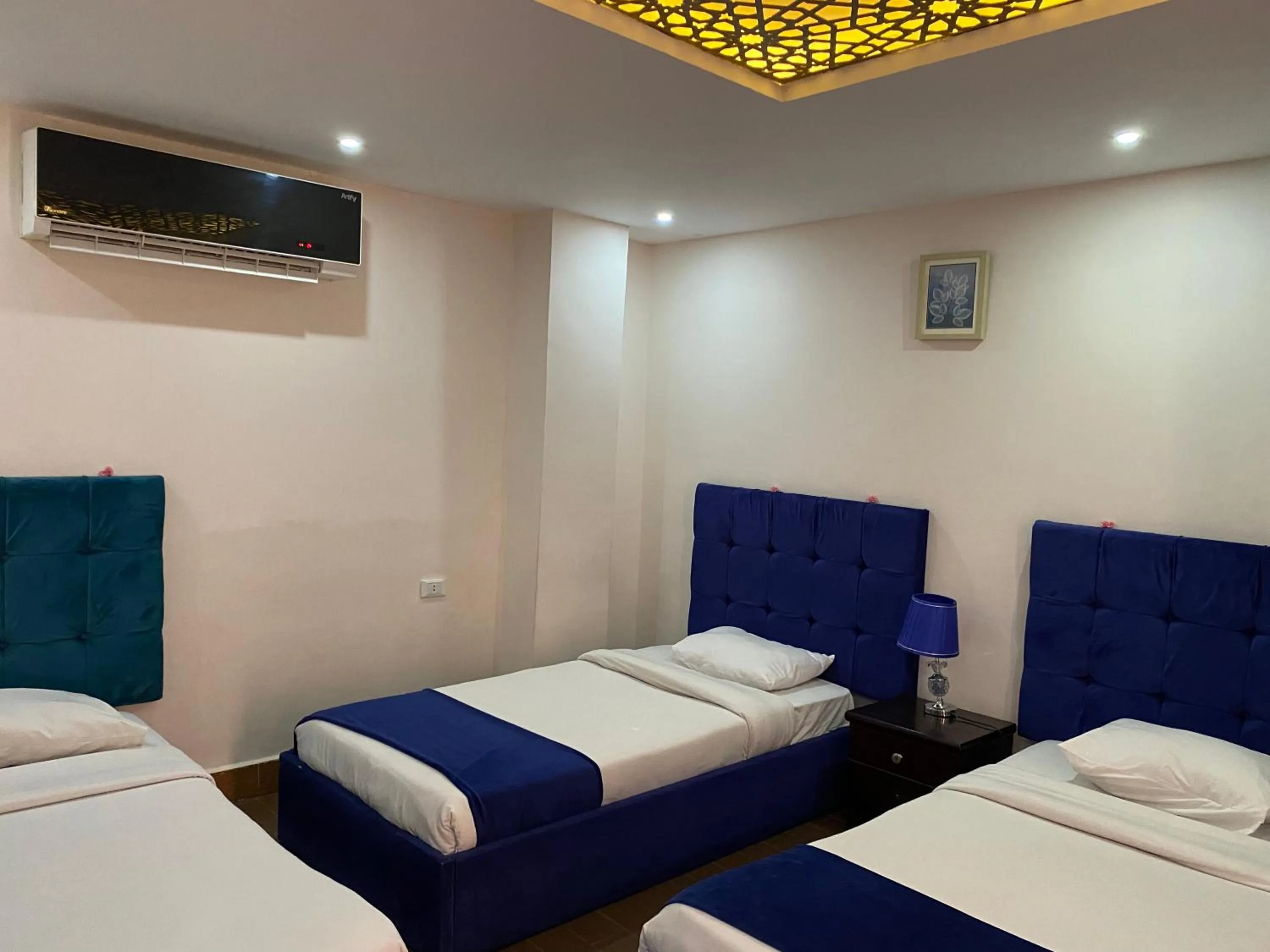 Bed in Golden Pyramids Inn