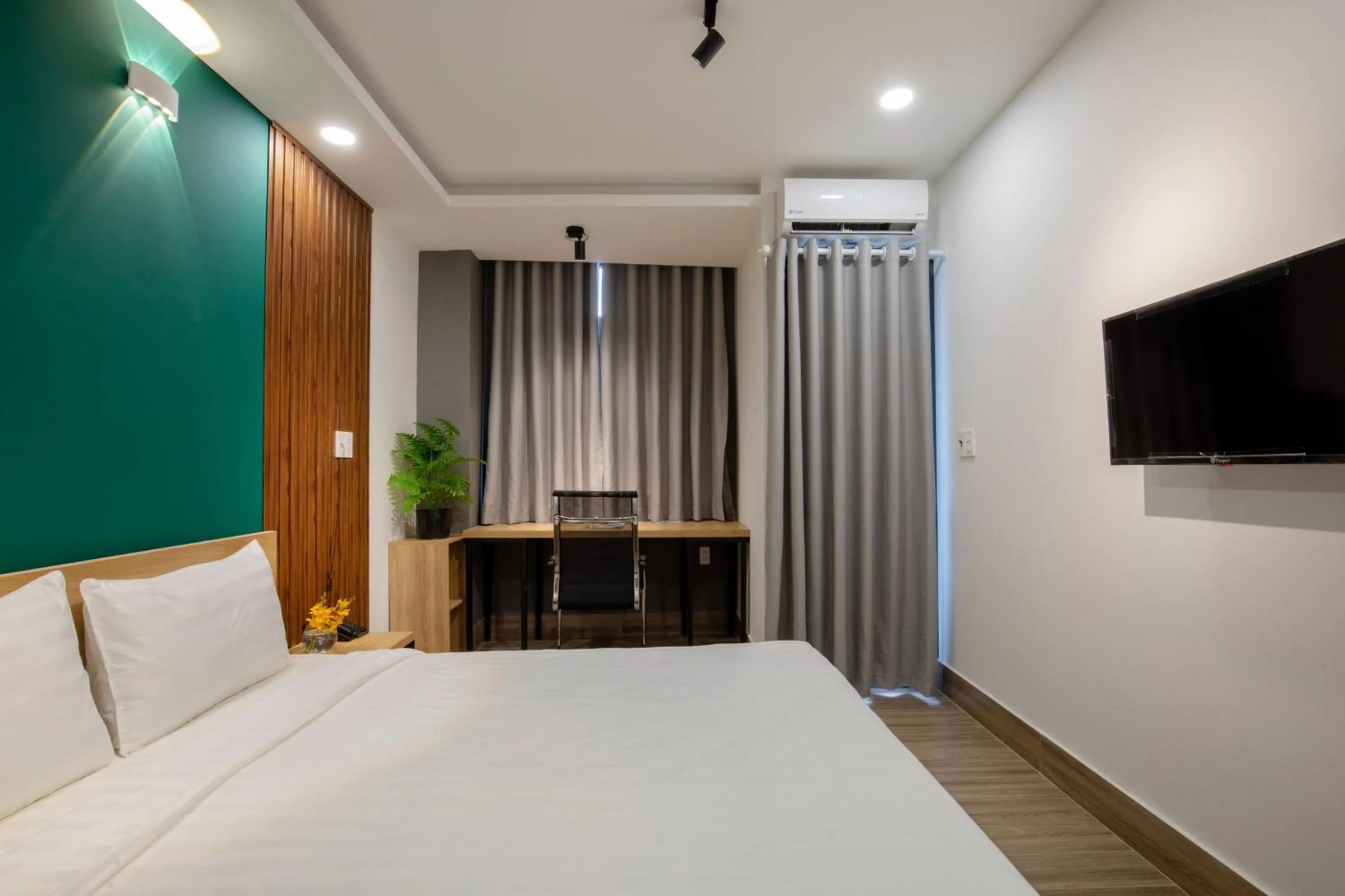 Bed in LÁ HOTEL RIVERSIDE