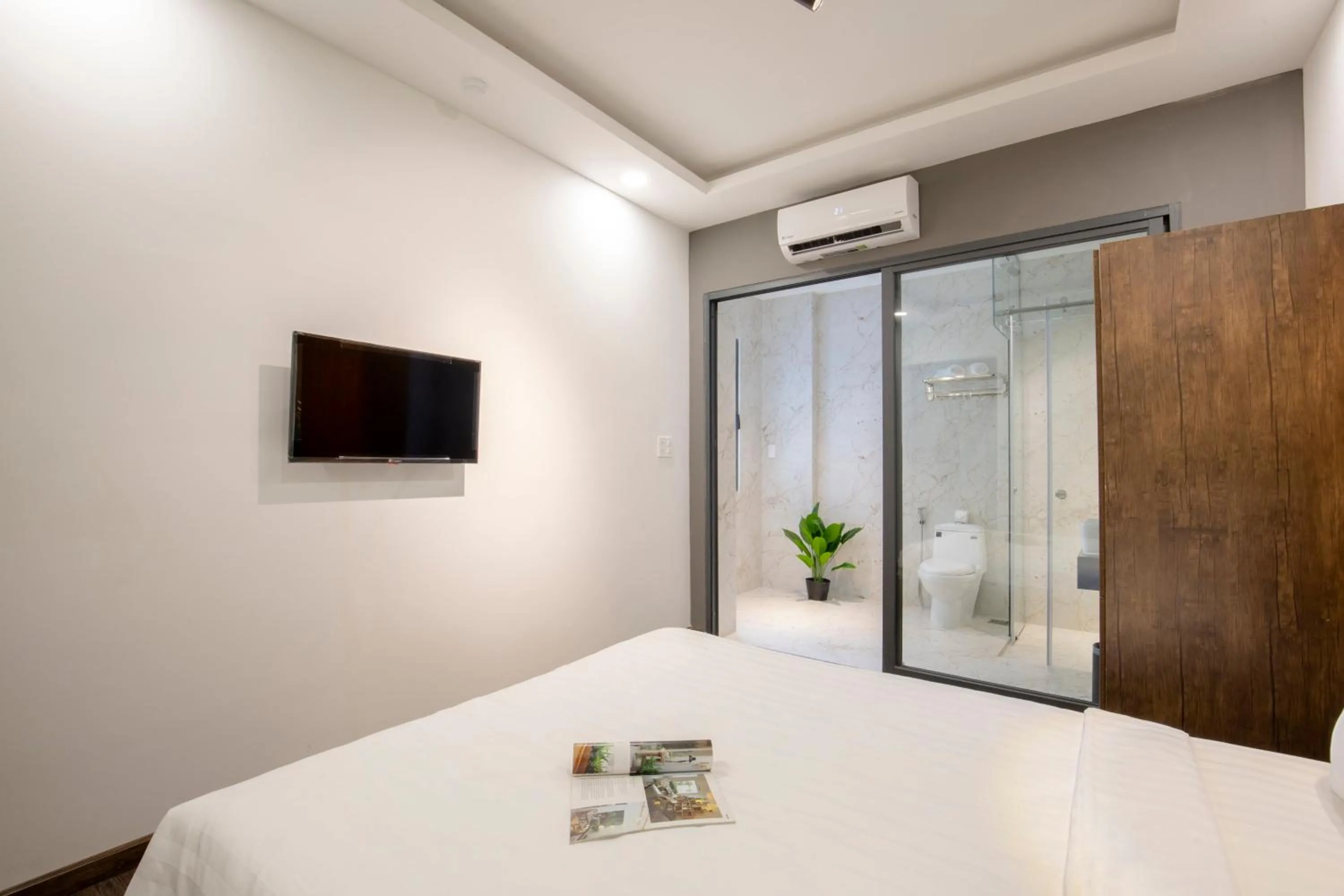 Bed in LÁ HOTEL RIVERSIDE