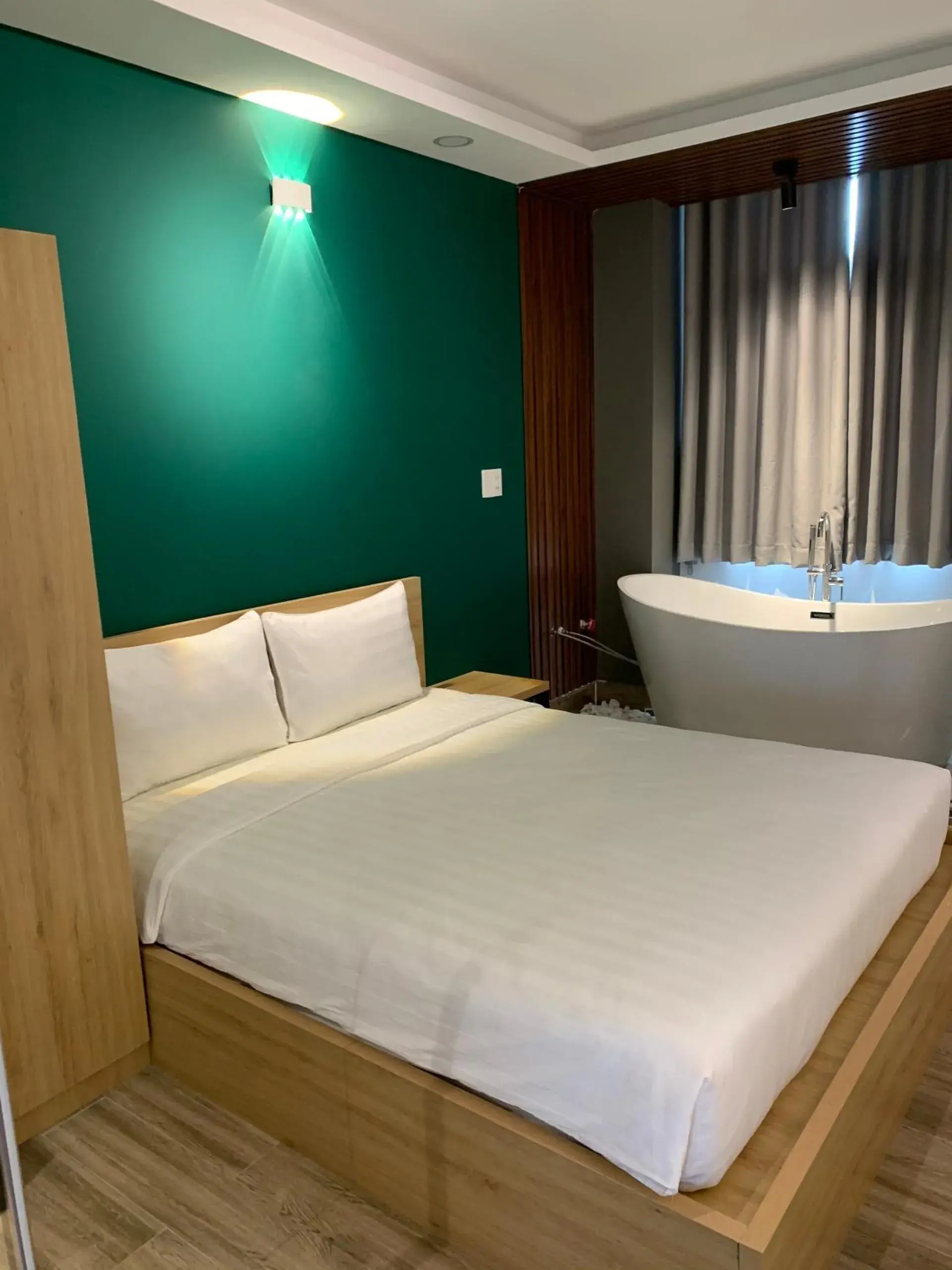 Bed in LÁ HOTEL RIVERSIDE Bed in LÁ HOTEL RIVERSIDE