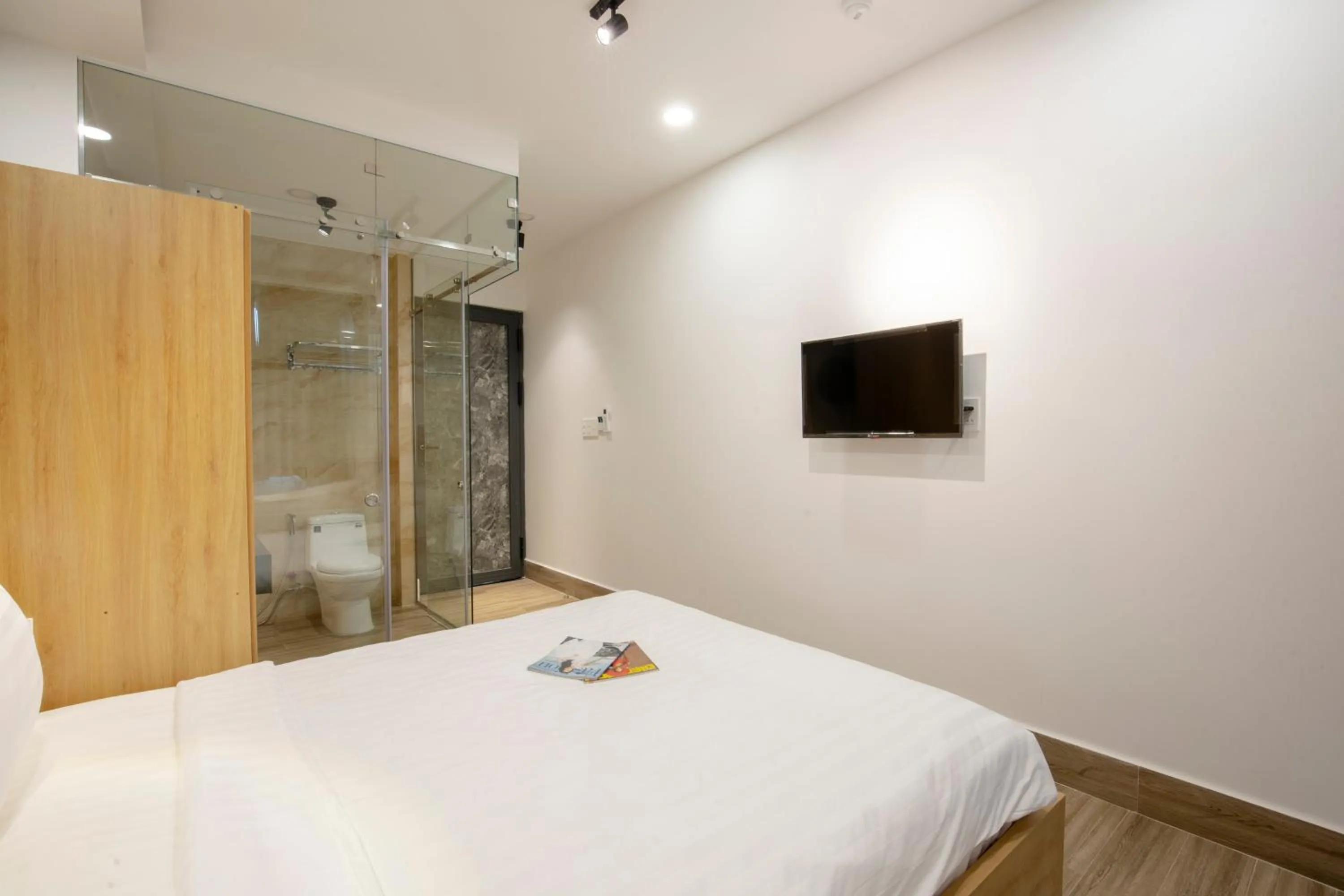 Bed in LÁ HOTEL RIVERSIDE