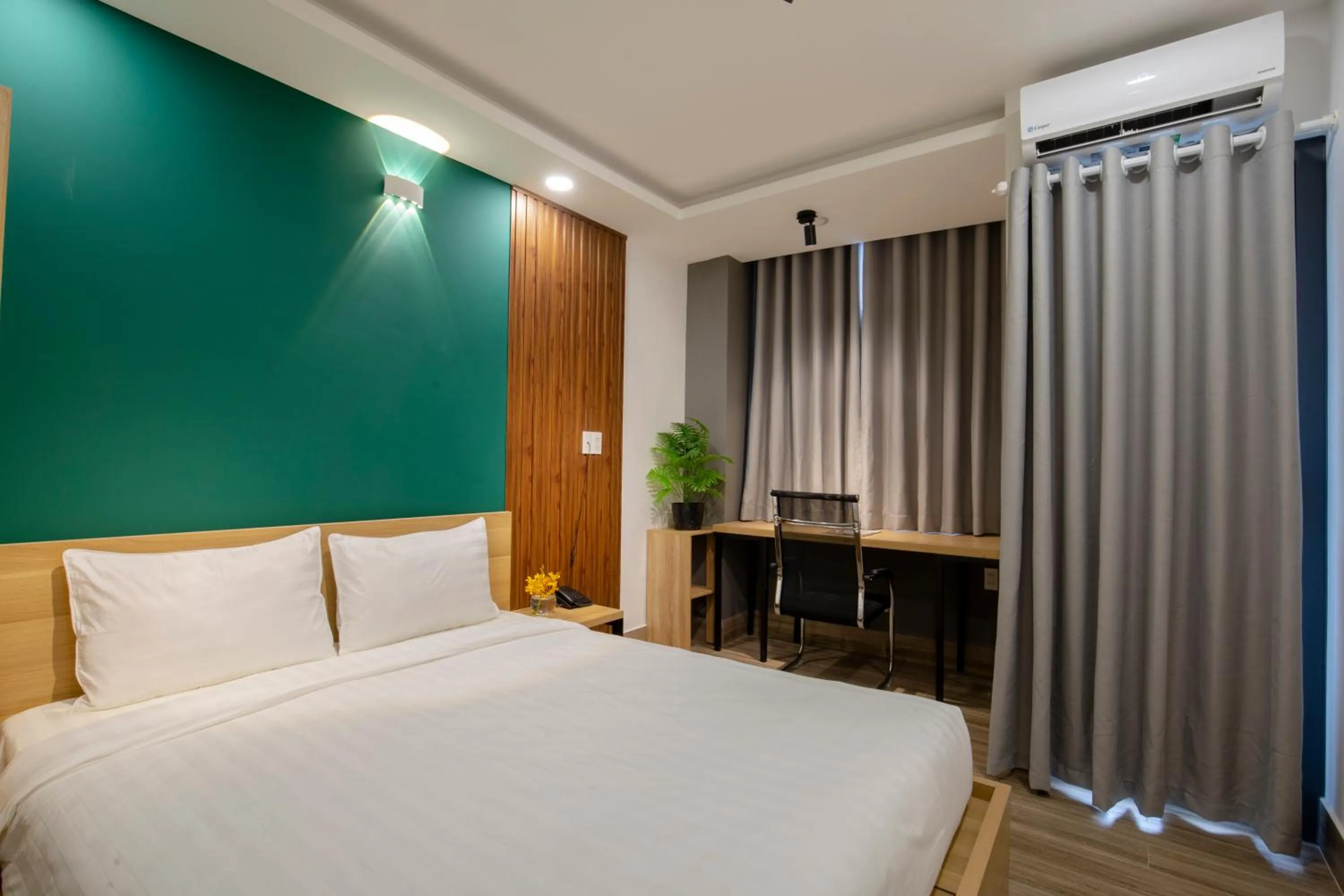 Bed in LÁ HOTEL RIVERSIDE