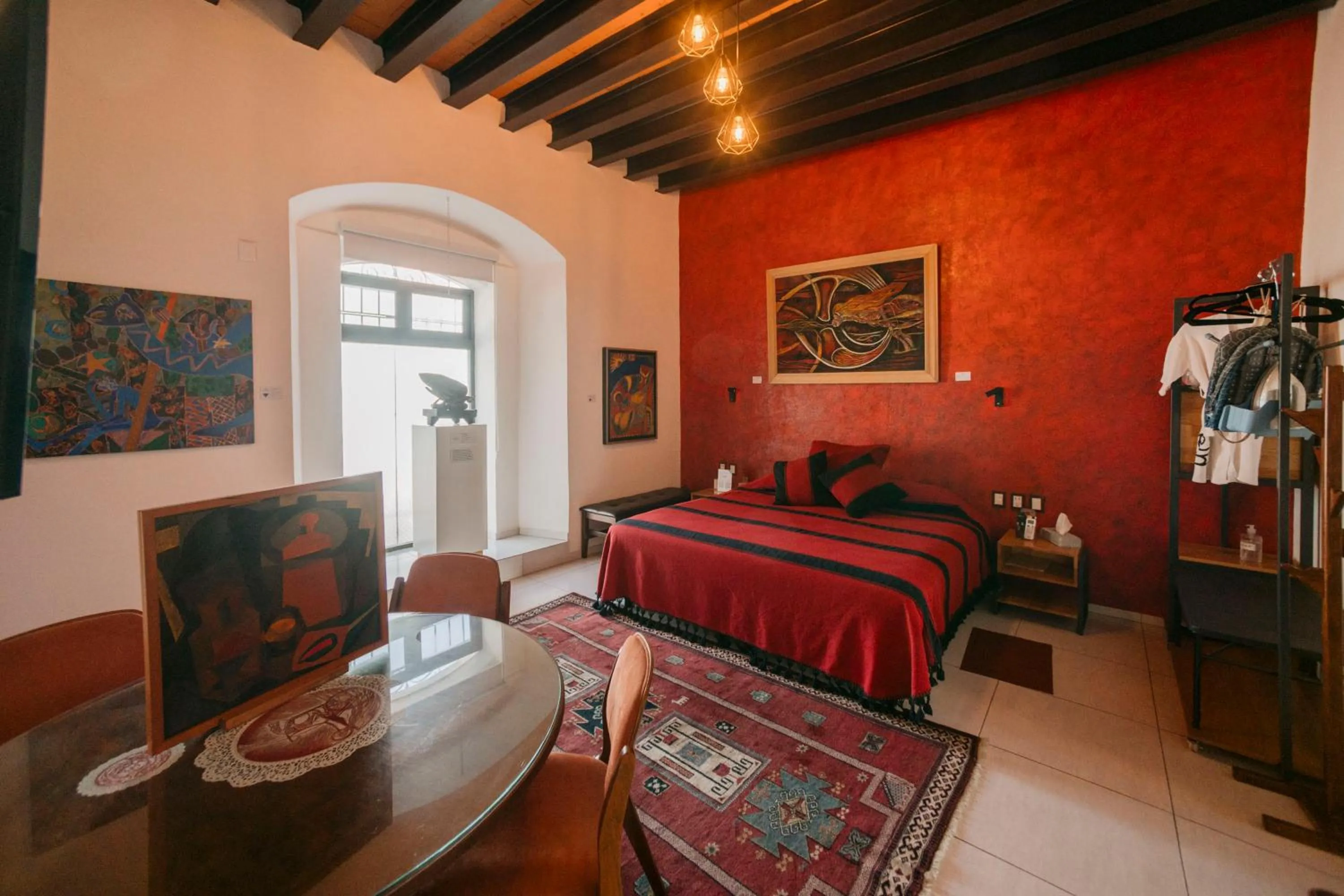 Bed in LARIMAR Gallery y Hotel Boutique
