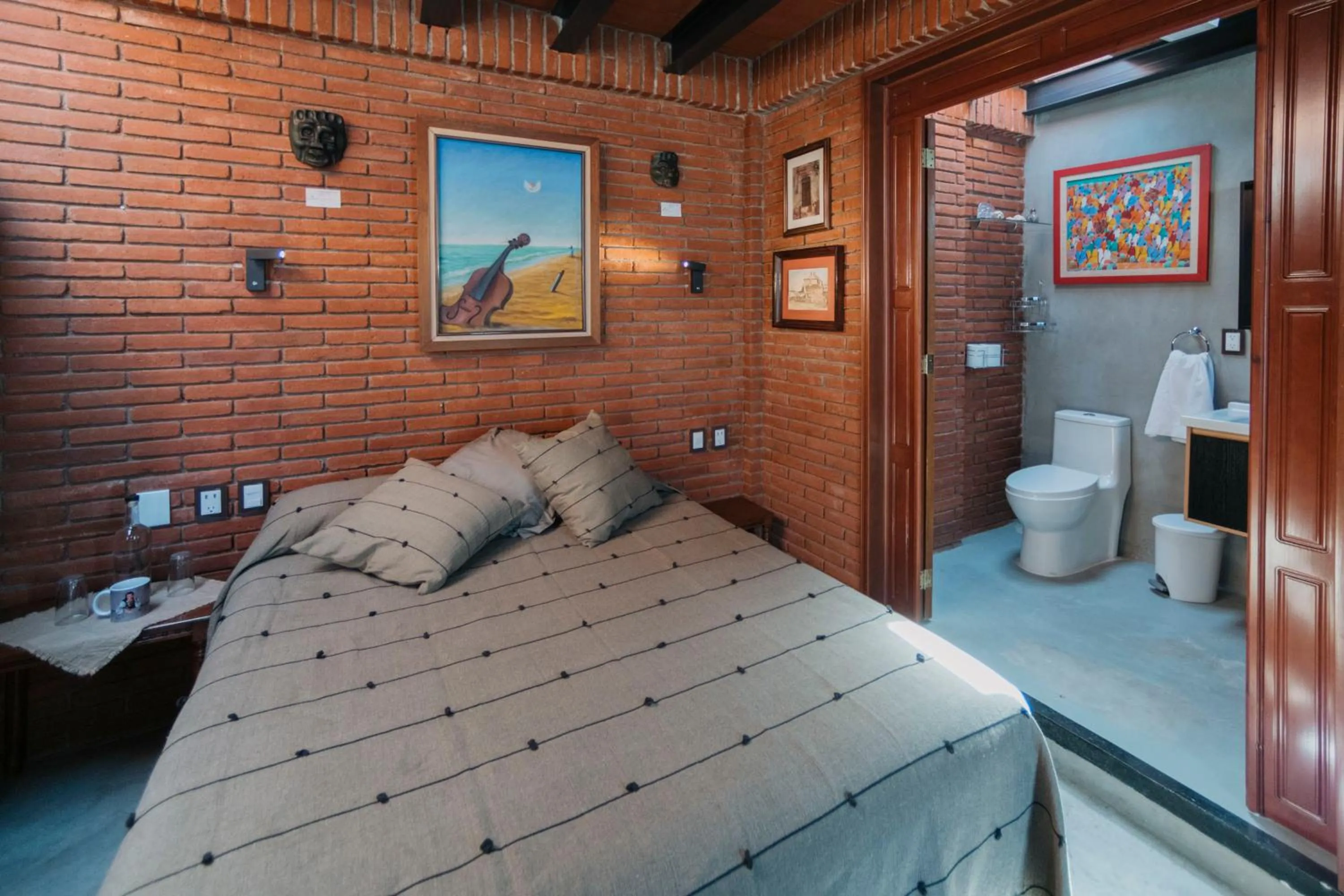 Bed in LARIMAR Gallery y Hotel Boutique