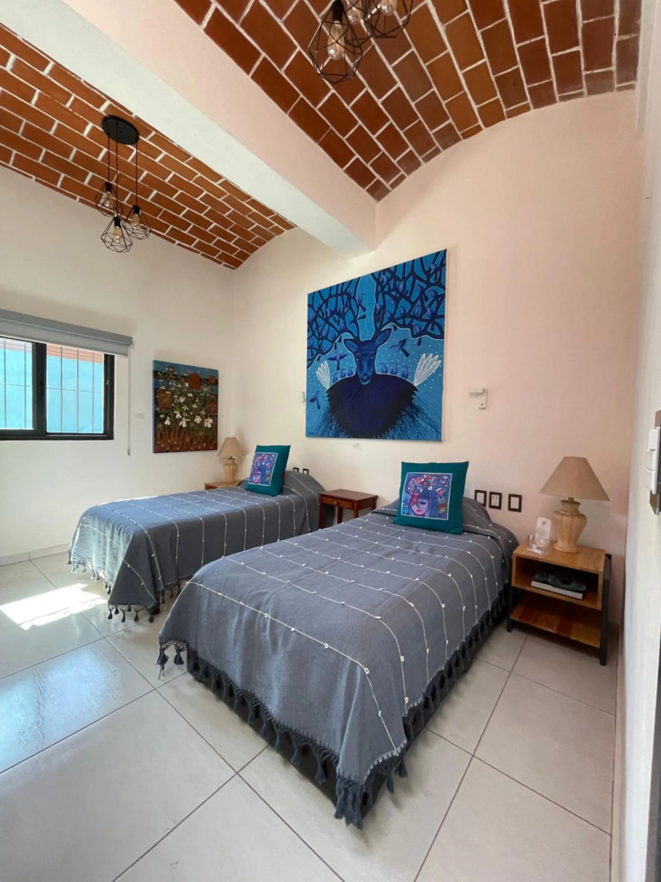 Bed in LARIMAR Gallery y Hotel Boutique