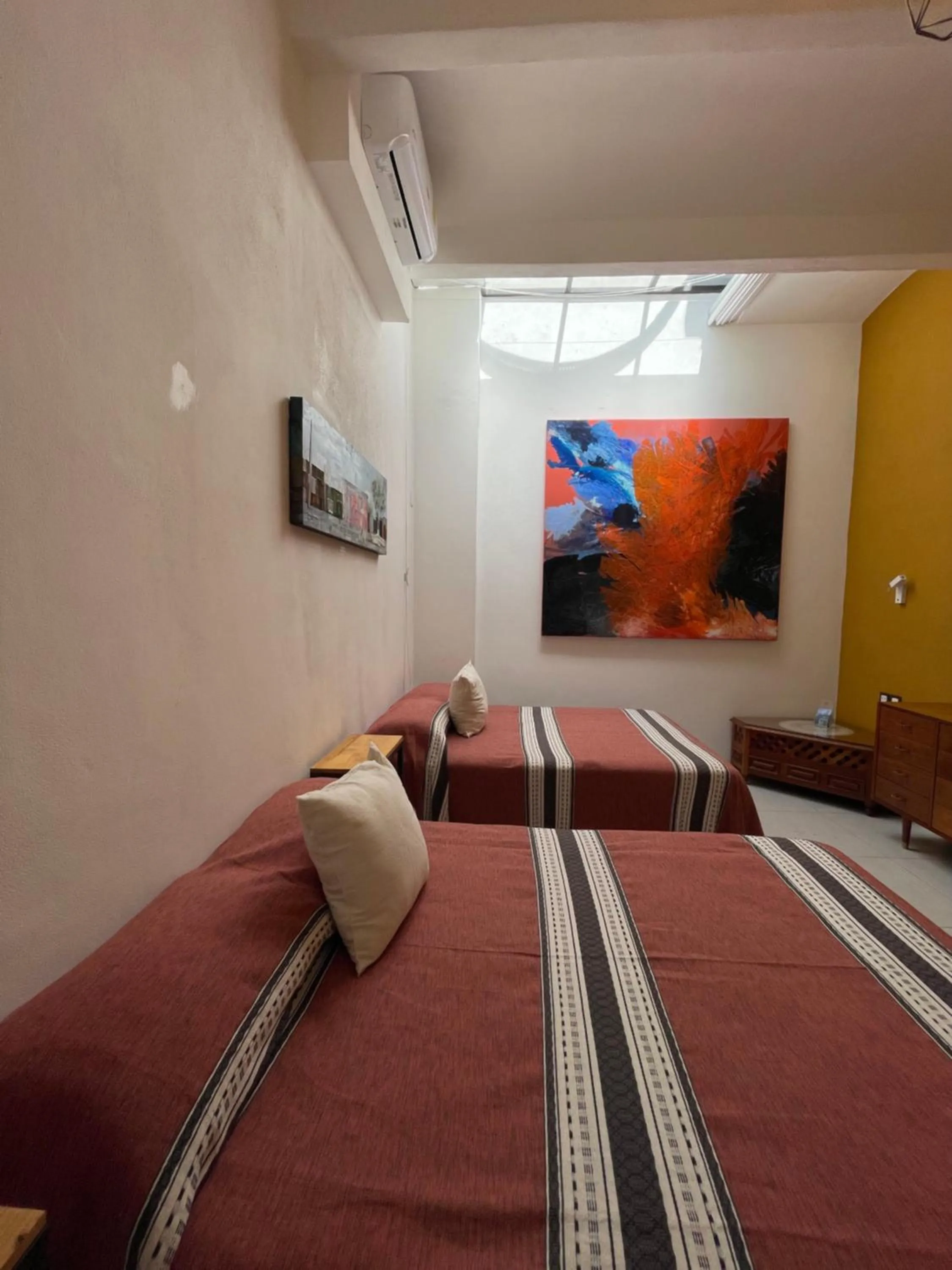 Bed in LARIMAR Gallery y Hotel Boutique