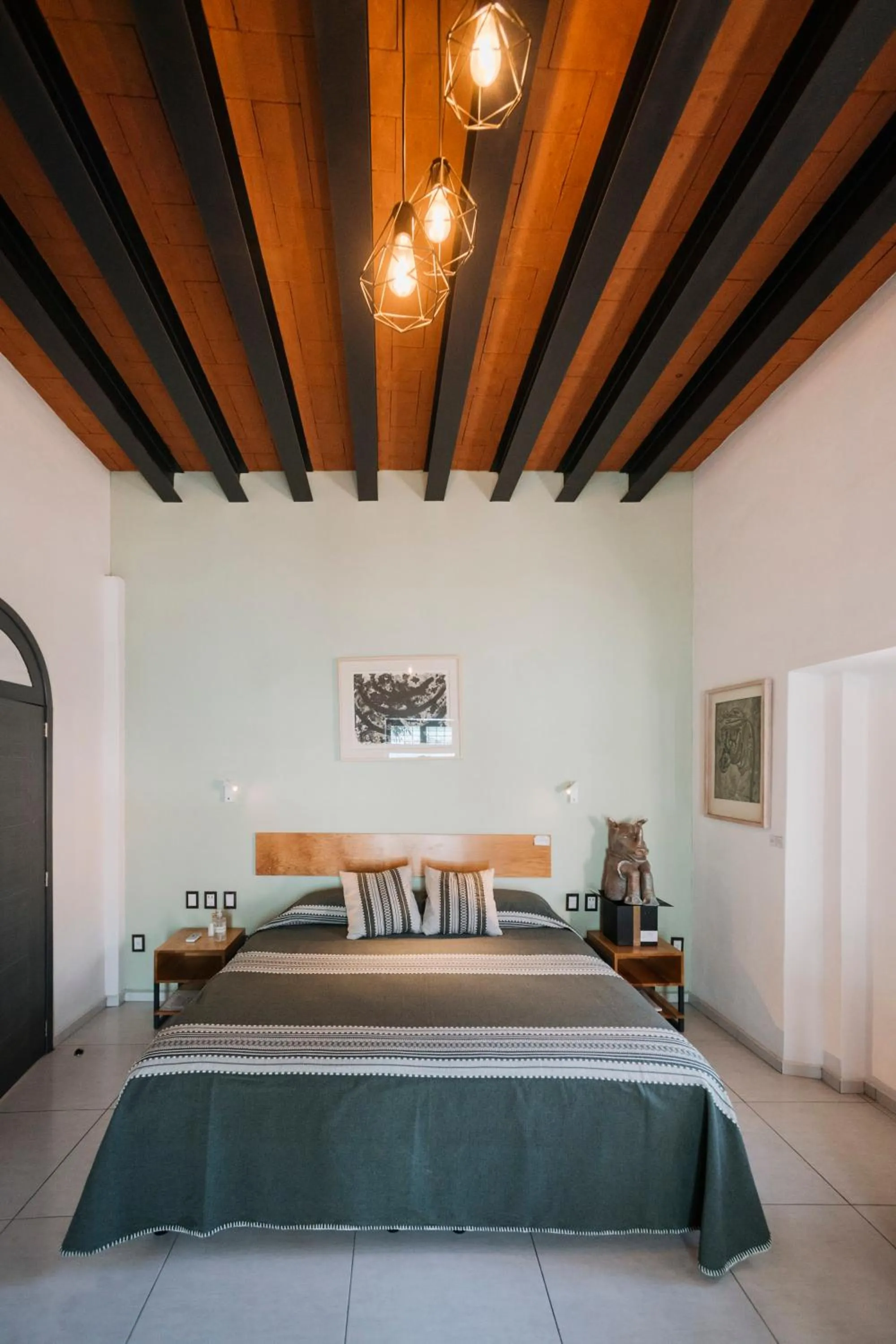 Bed in LARIMAR Gallery y Hotel Boutique