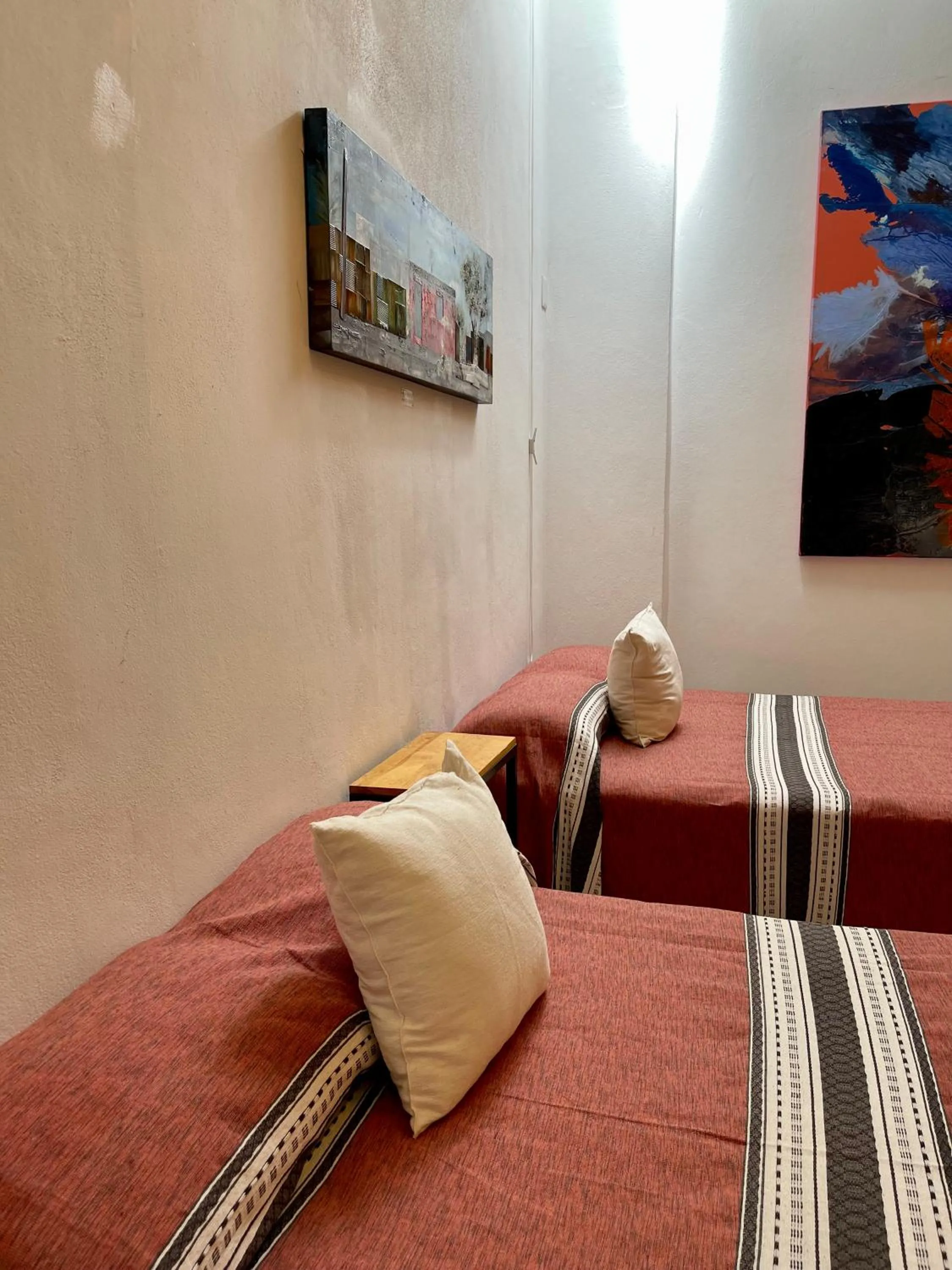 Bed in LARIMAR Gallery y Hotel Boutique
