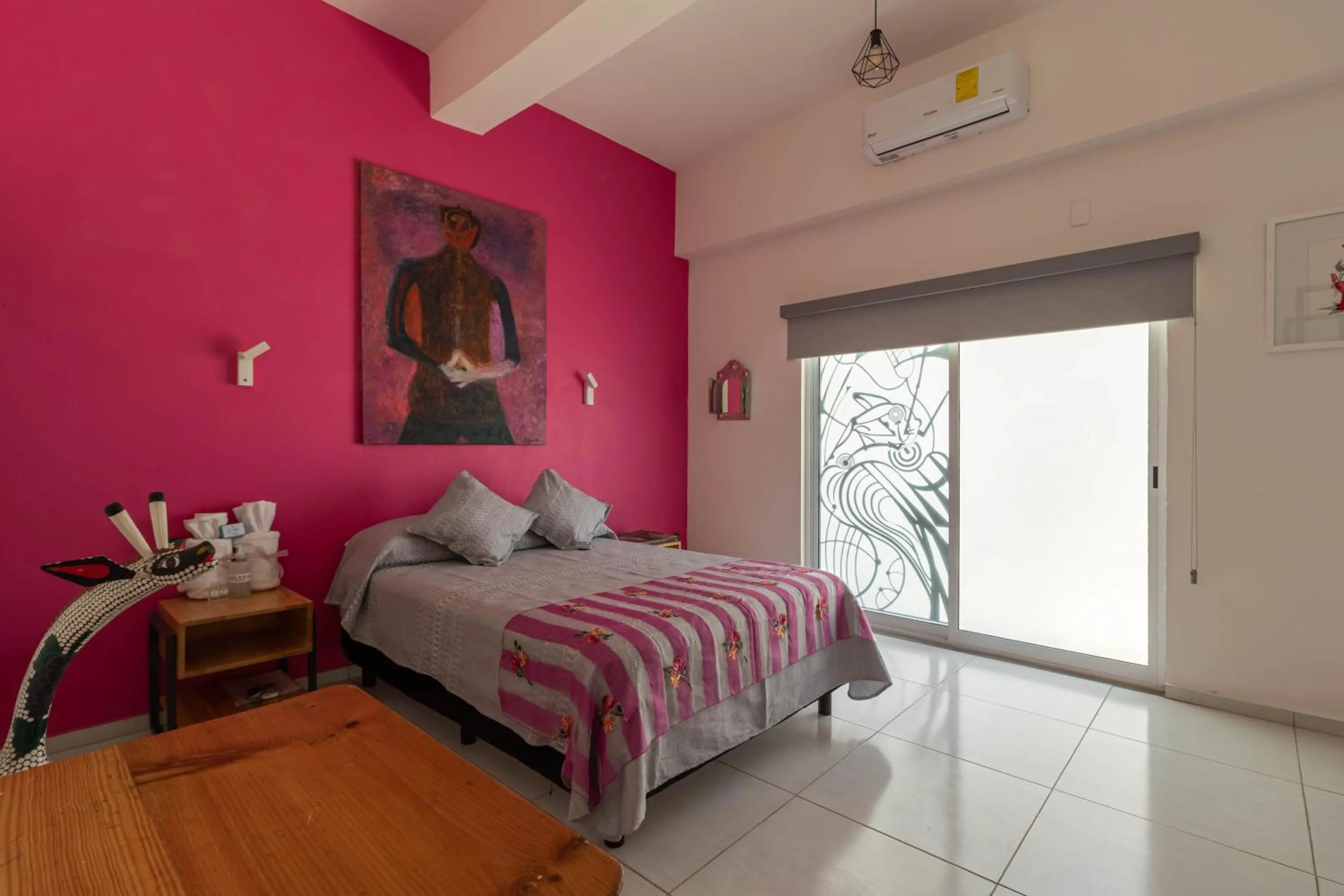 Photo of the whole room, Bed in LARIMAR Gallery y Hotel Boutique