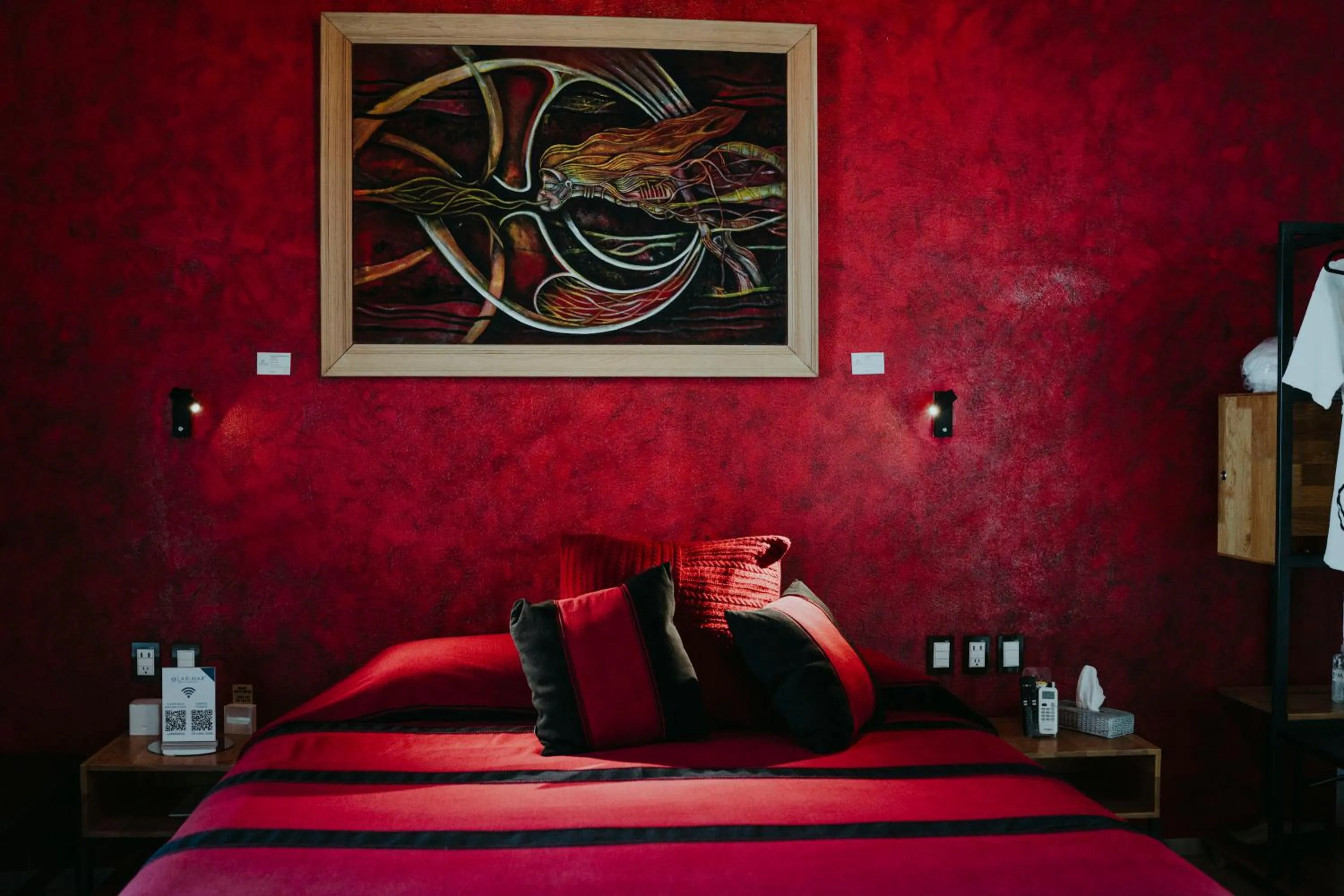 Bed in LARIMAR Gallery y Hotel Boutique