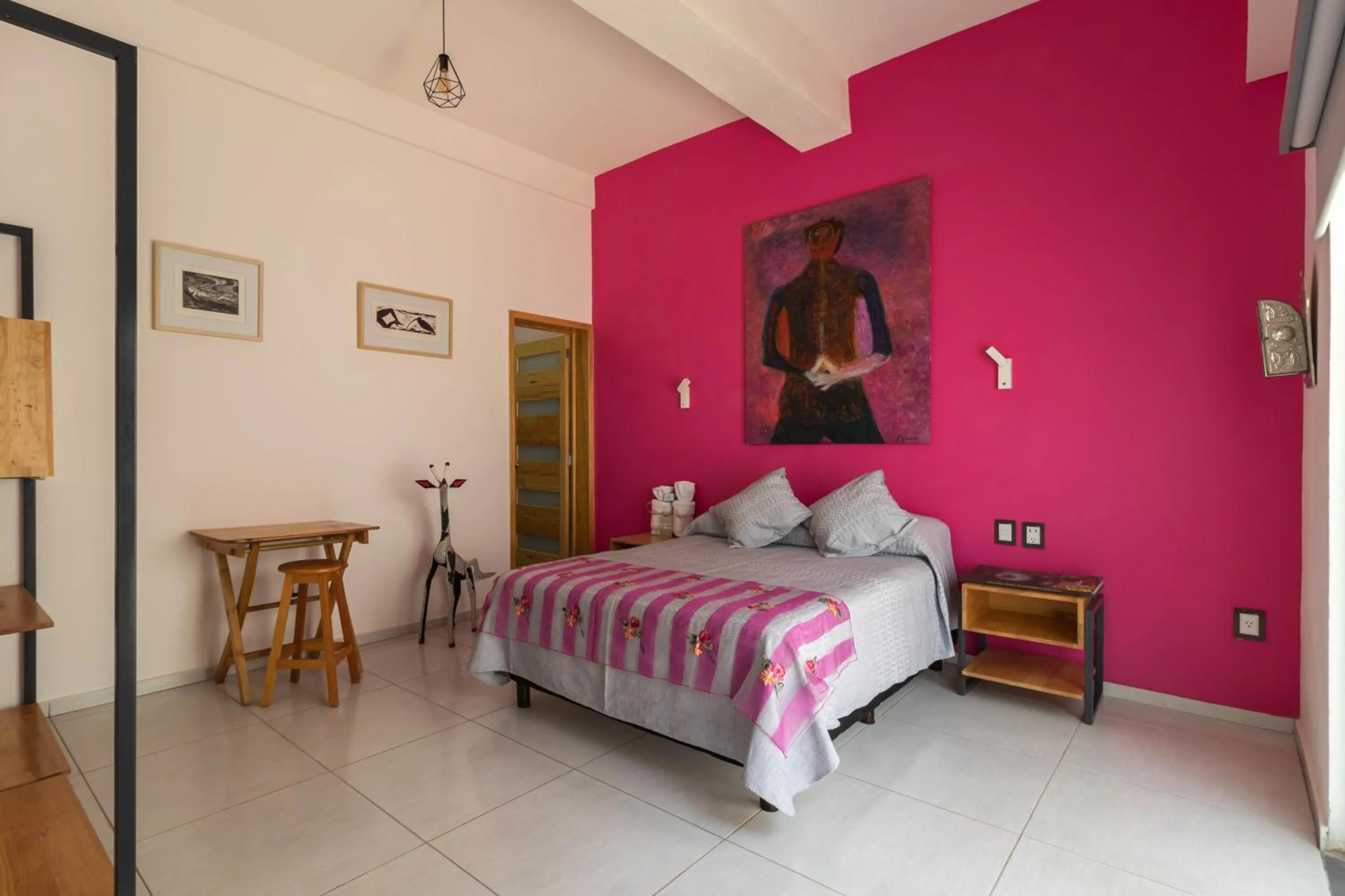Photo of the whole room, Bed in LARIMAR Gallery y Hotel Boutique