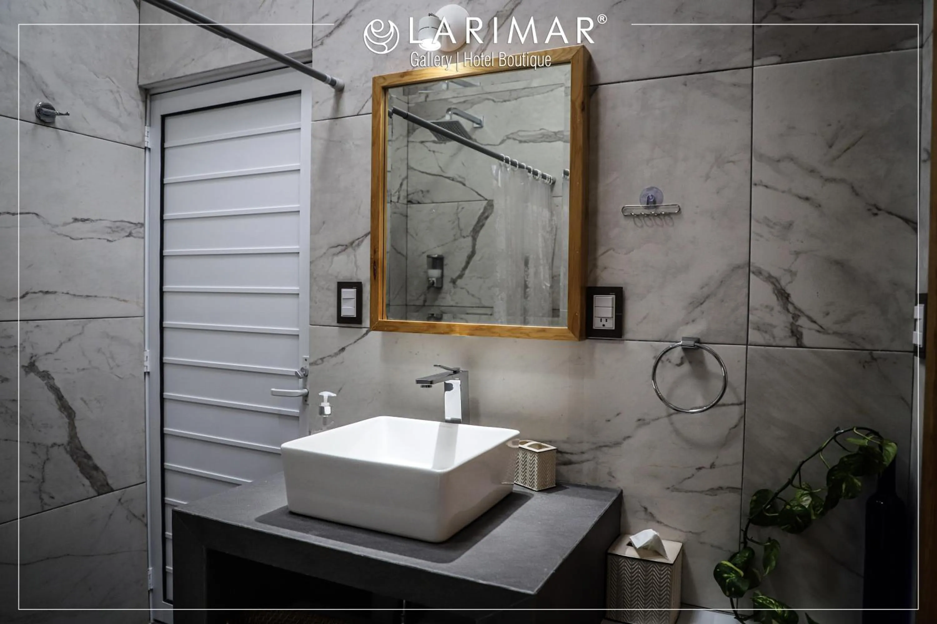 Bathroom in LARIMAR Gallery y Hotel Boutique