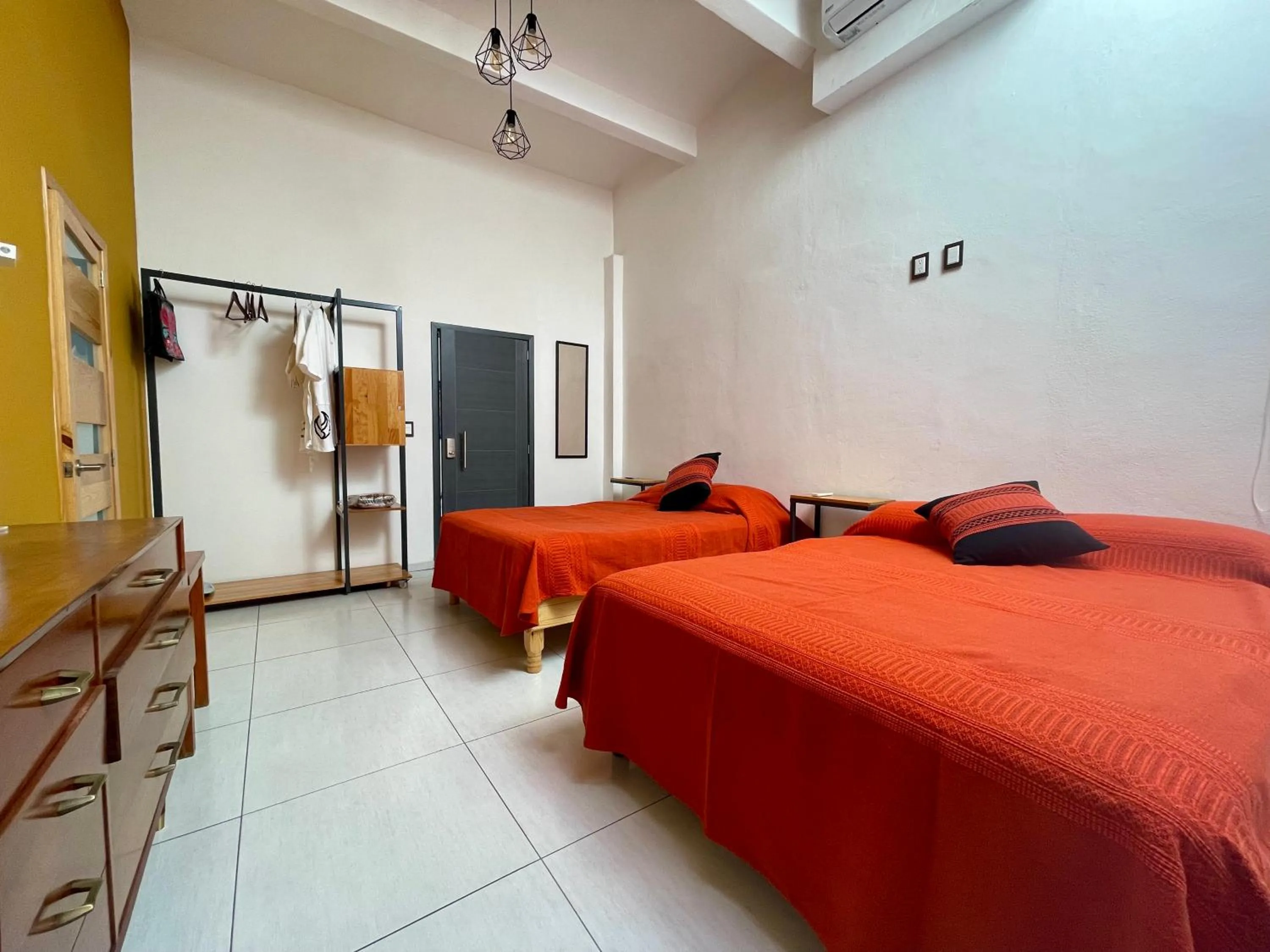 Bed in LARIMAR Gallery y Hotel Boutique