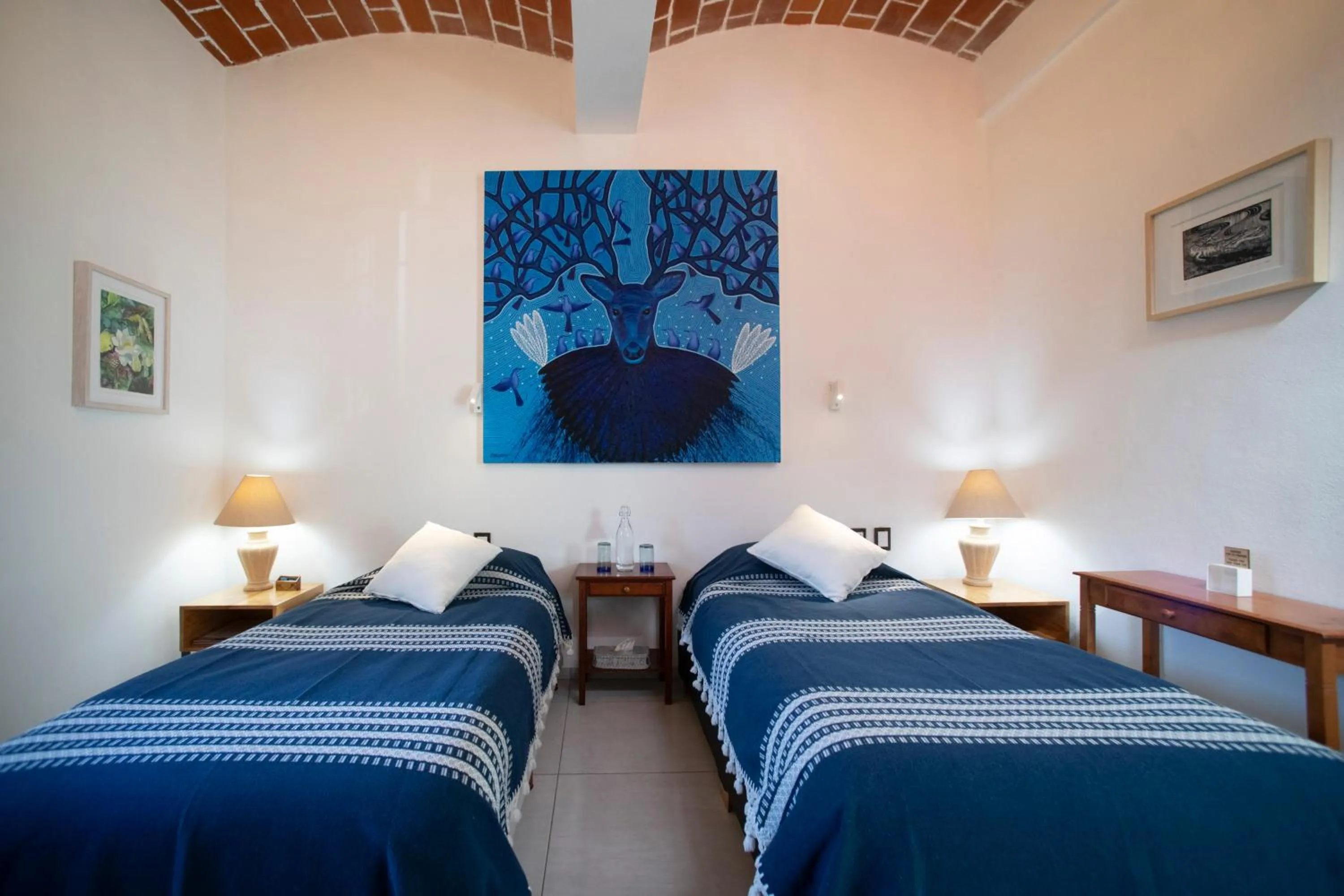 Bed in LARIMAR Gallery y Hotel Boutique