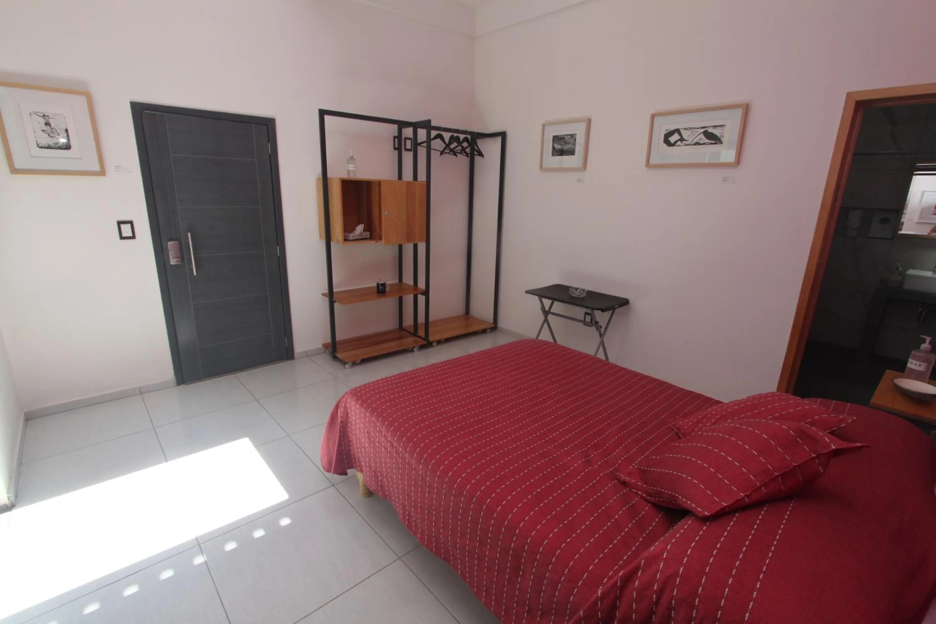 Photo of the whole room, Bed in LARIMAR Gallery y Hotel Boutique