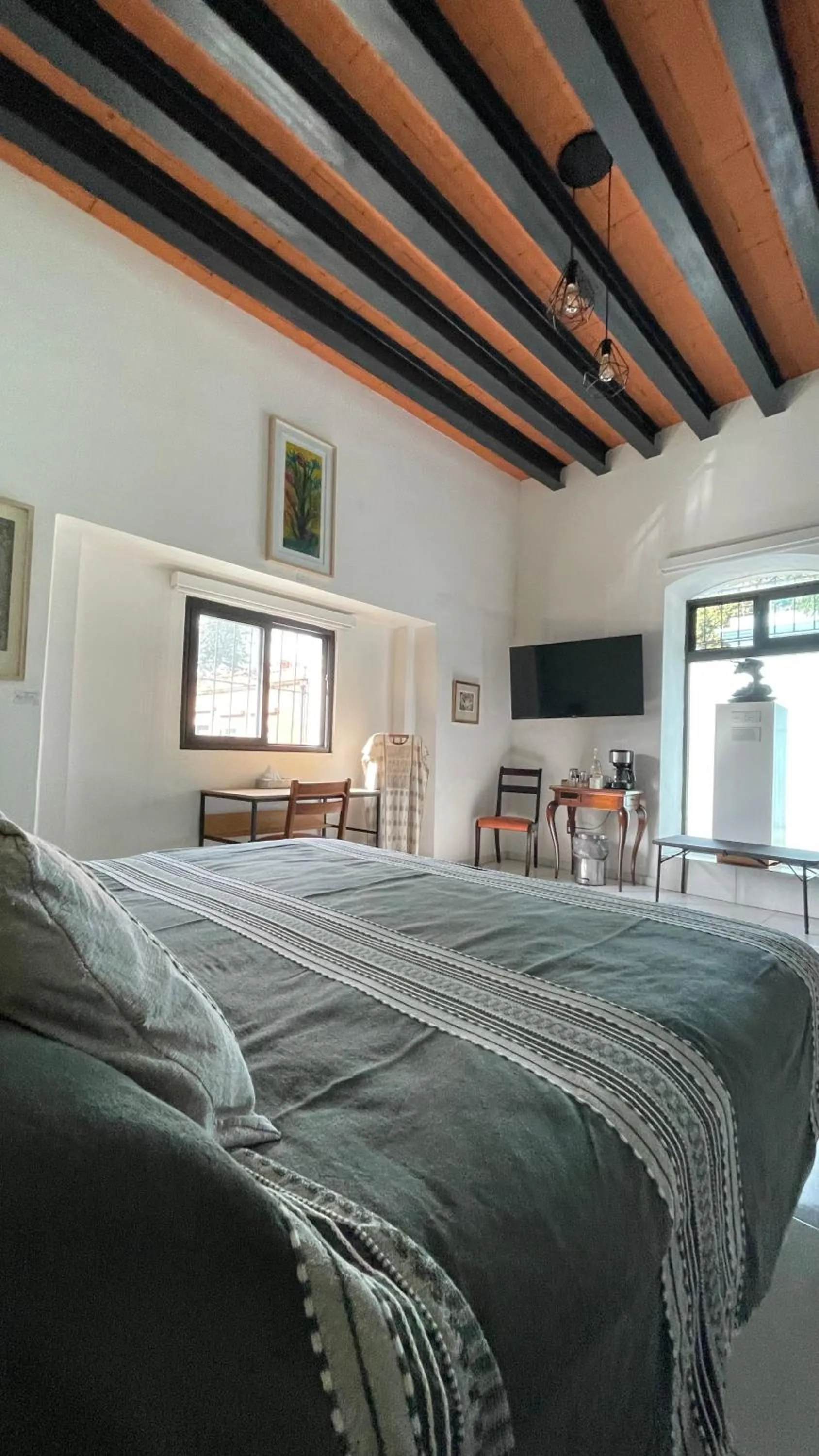 Bed in LARIMAR Gallery y Hotel Boutique