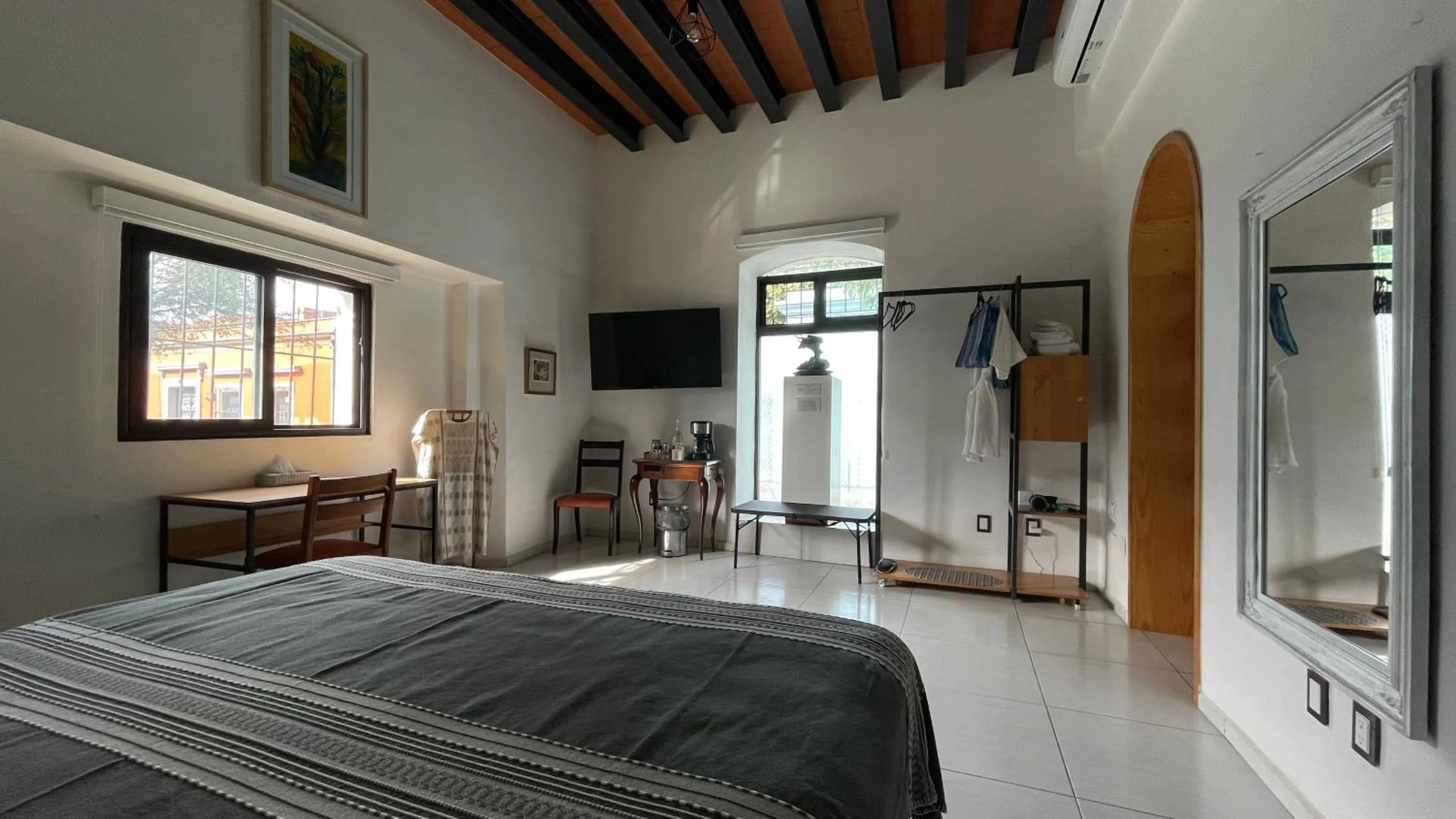Bed in LARIMAR Gallery y Hotel Boutique