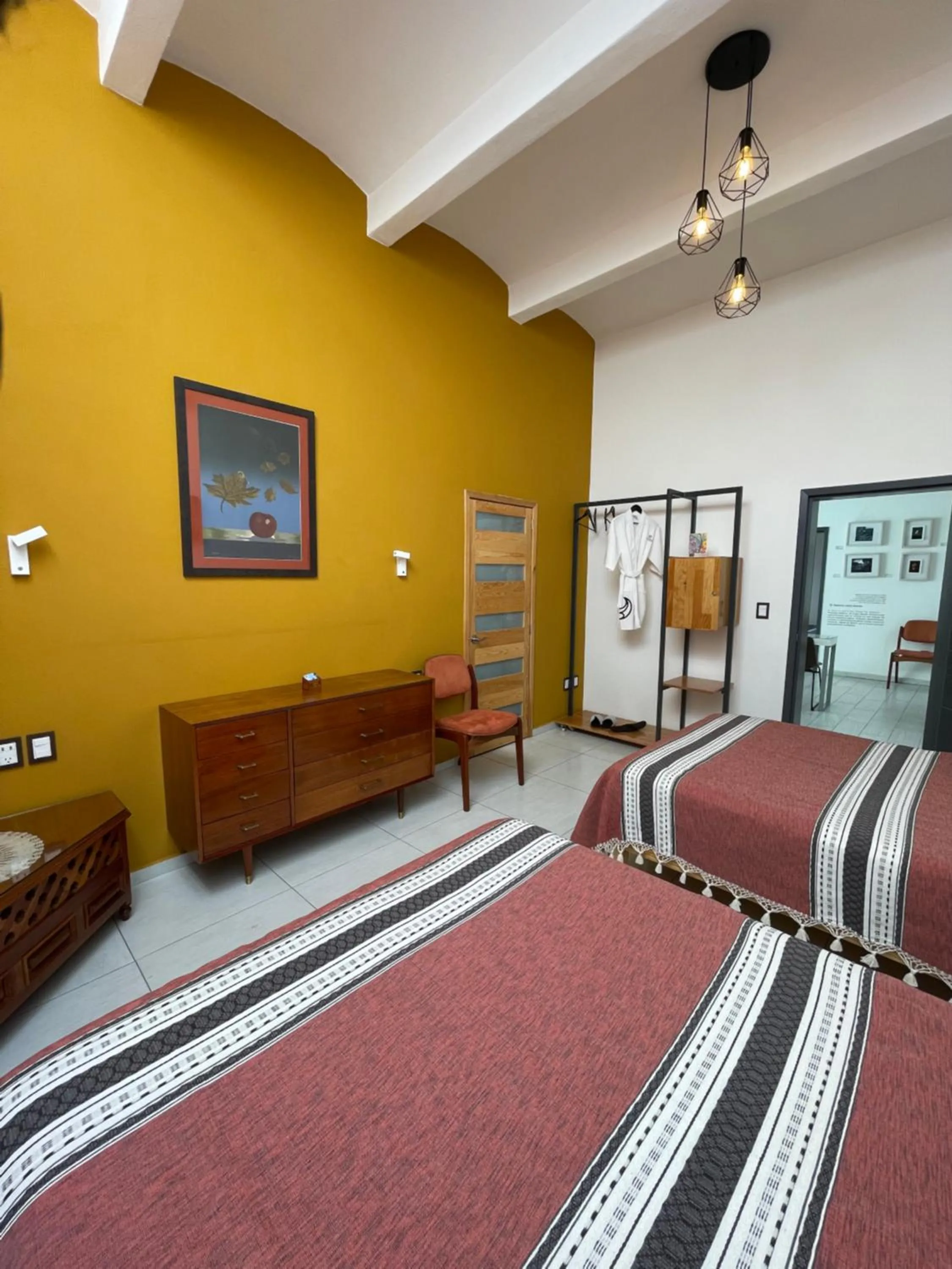 Bed in LARIMAR Gallery y Hotel Boutique
