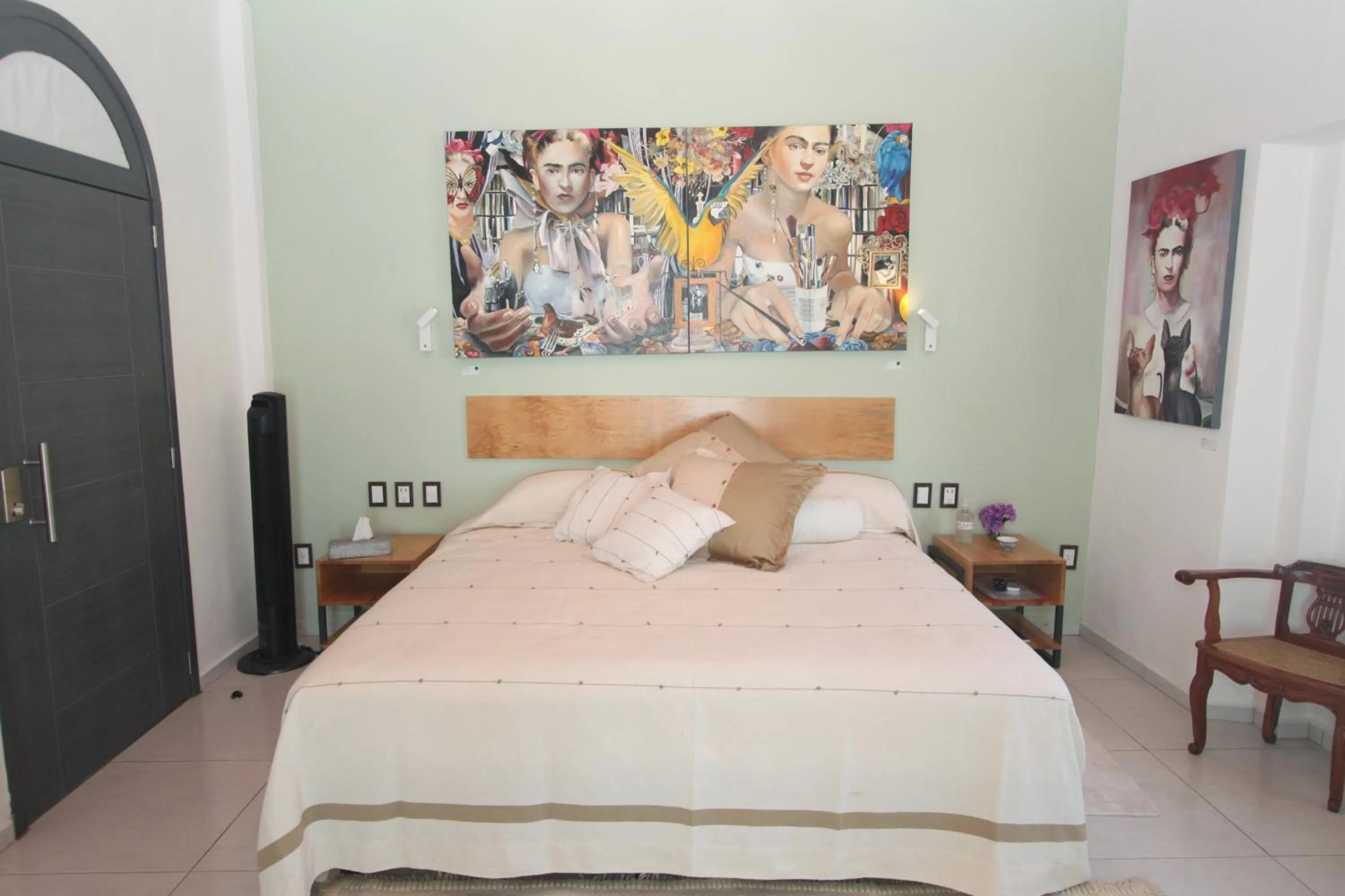 Bed in LARIMAR Gallery y Hotel Boutique